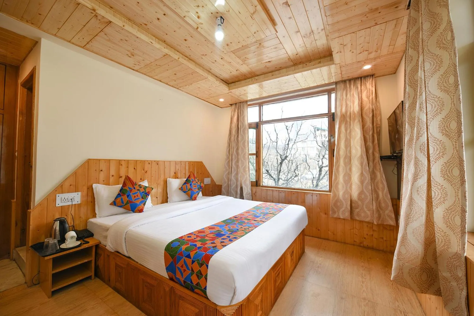 Bed in FabHotel Misty Hills Nehru Kund