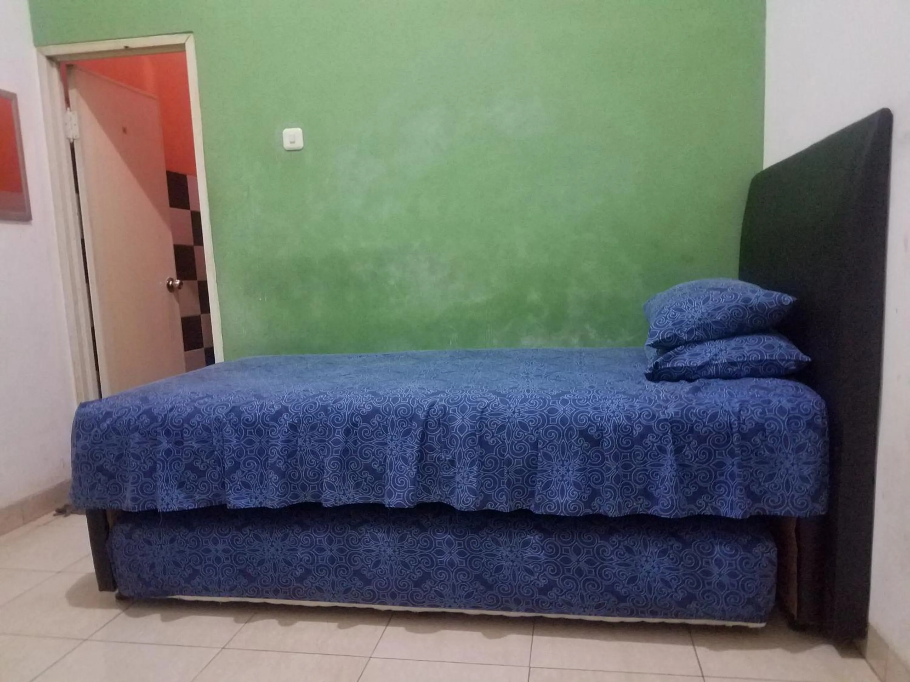 Bed in Cendrawasih Syariah Homestay