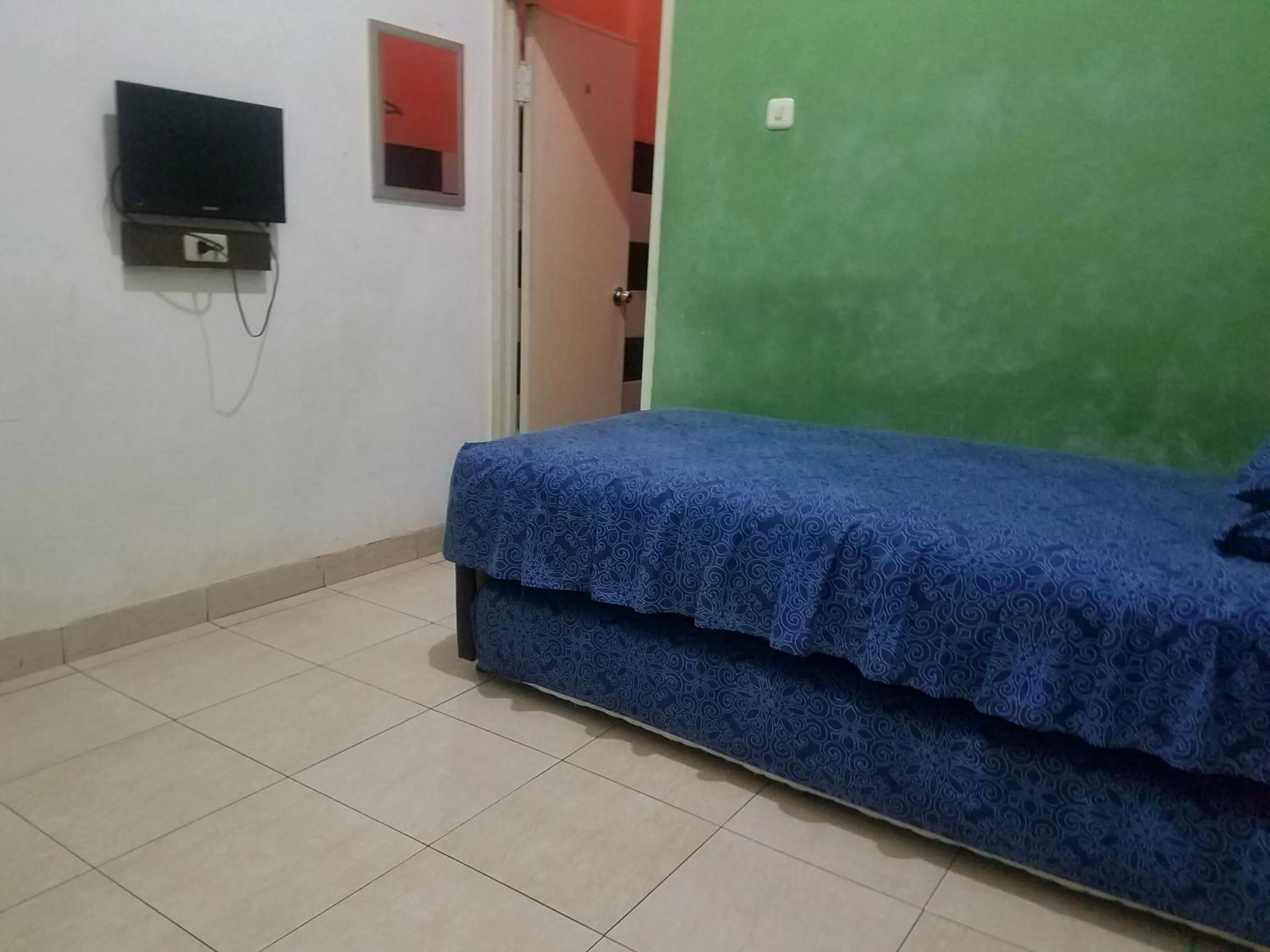 Bed in Cendrawasih Syariah Homestay