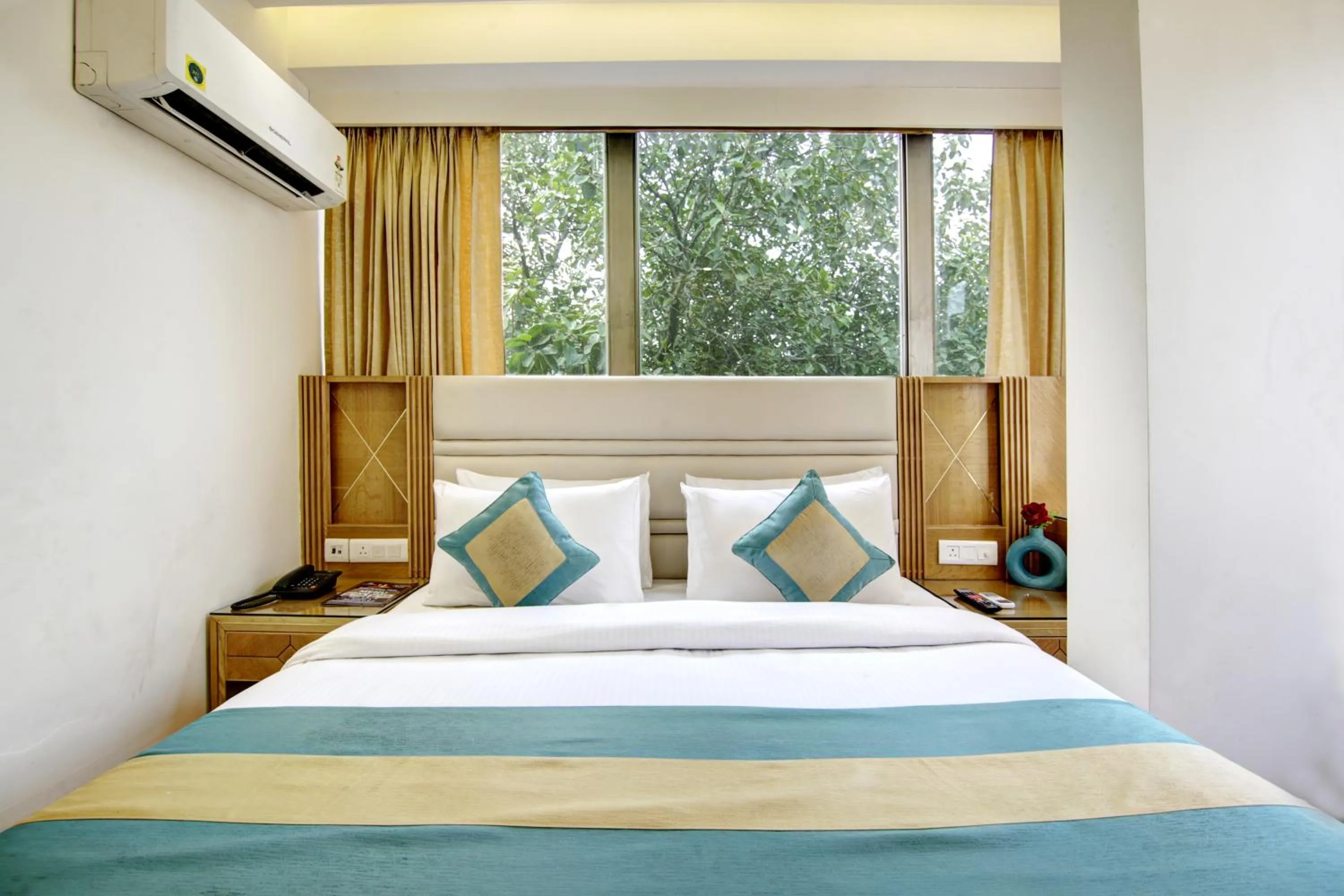 Bedroom, Bed in Hotel Krishna Plaza Just Near New Delhi Station And Connaught Place By M S Hospitality