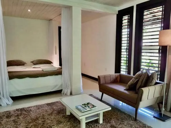 Living room, Bed in Mangueira Boutique Hotel Moreré