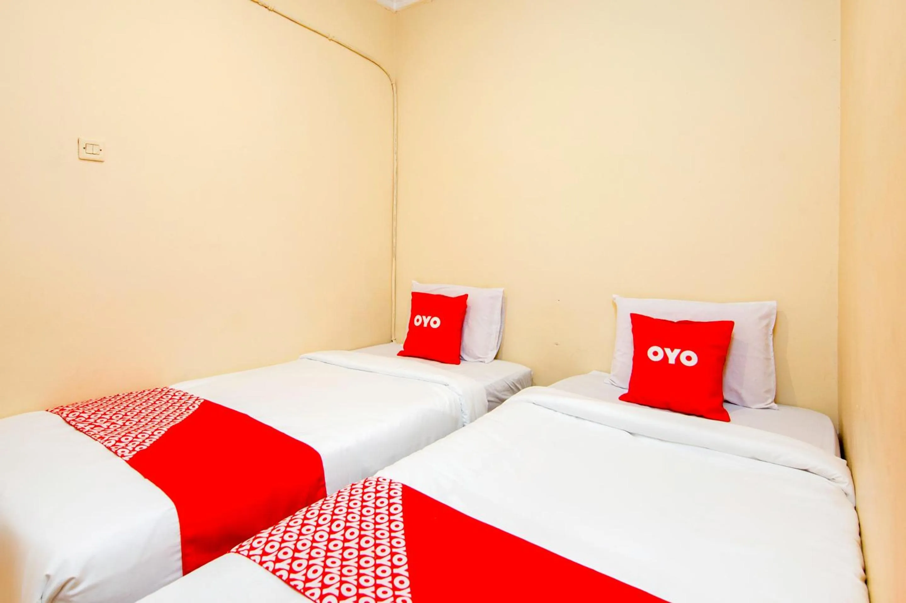 Bedroom in Hotel O 211