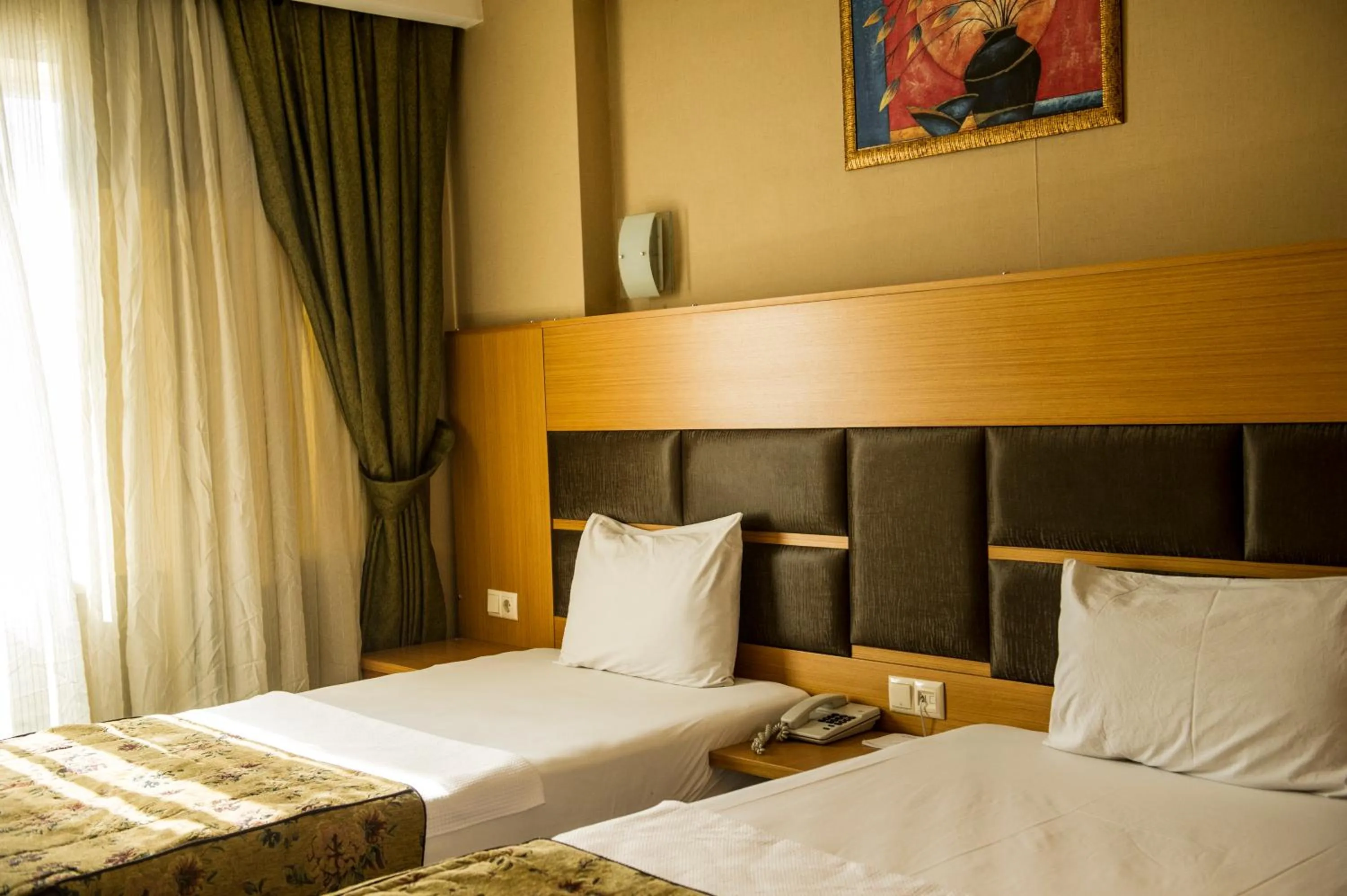 Bed in Polat Elite Hotel
