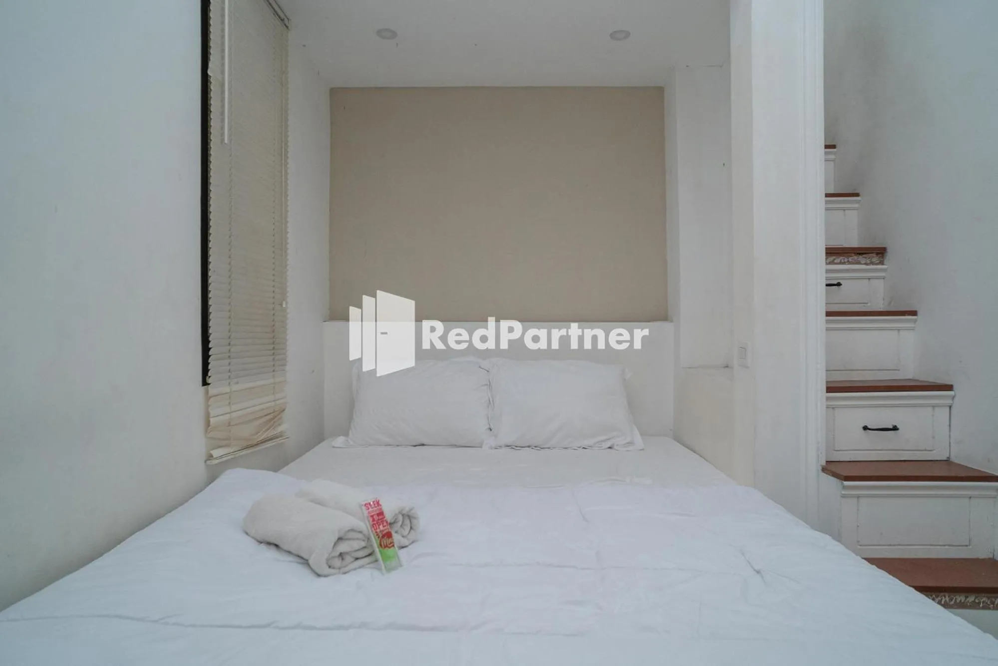 Bed in Yayah Rooms Bogor Syariah Mitra RedDoorz