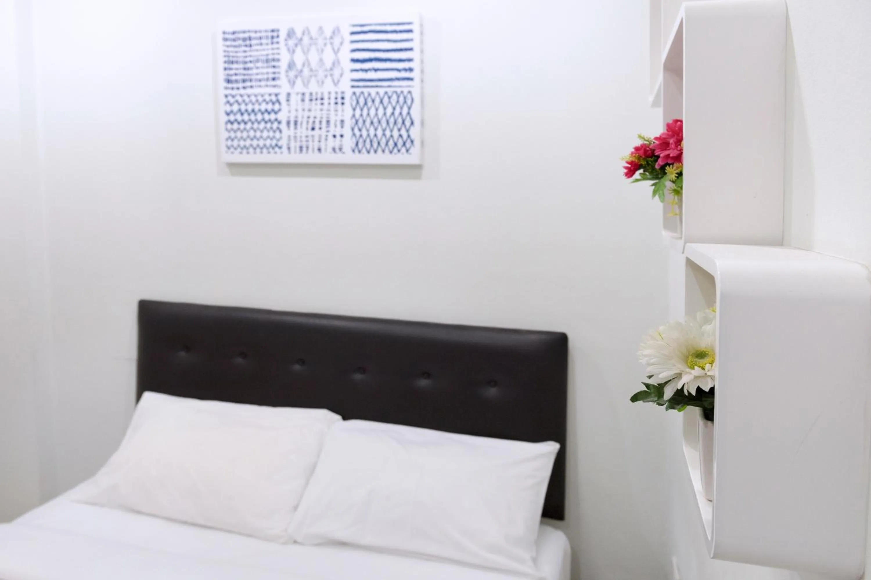 Bed in Mee Hug Guesthouse