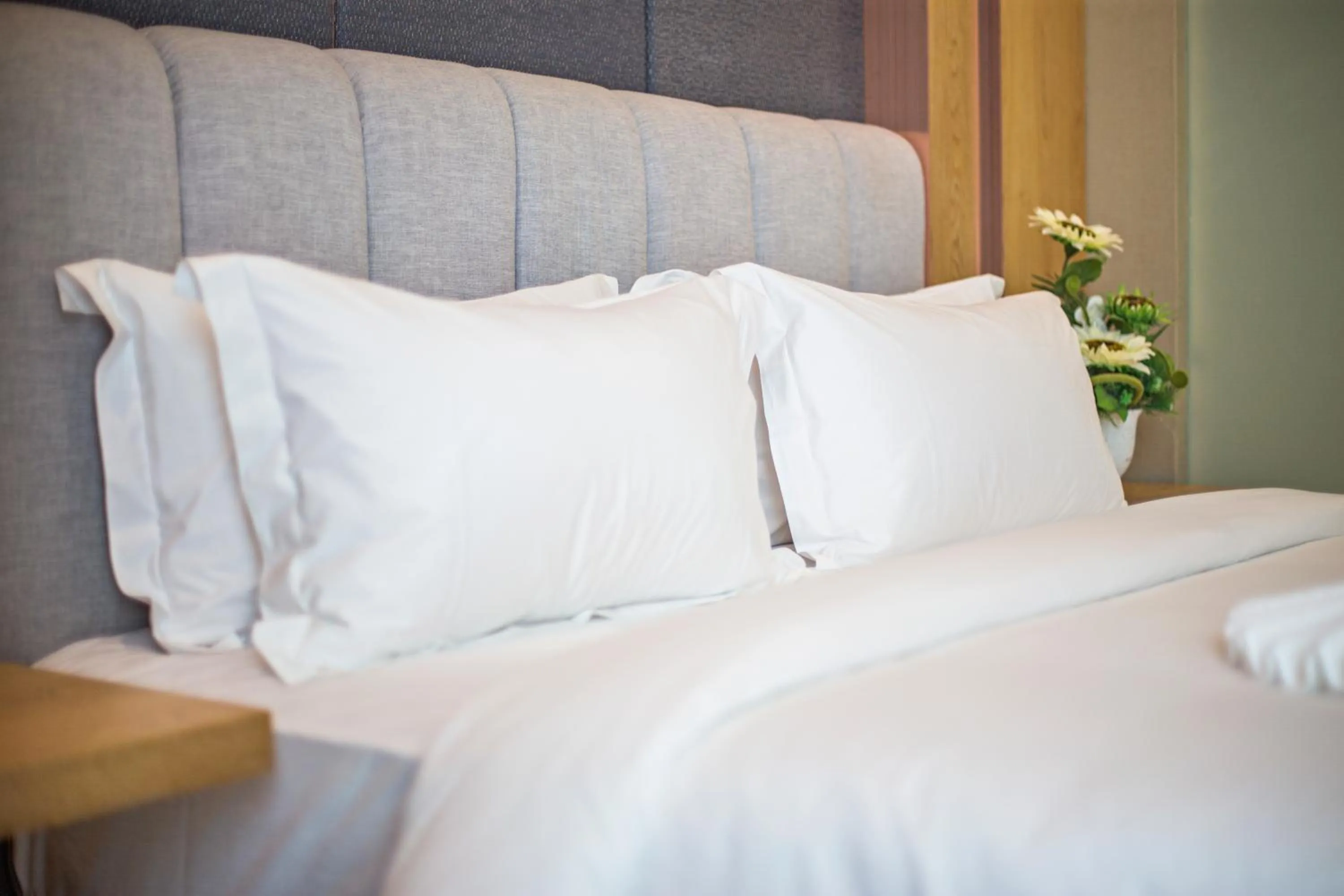 Bed in GRAND FLORA HOTEL