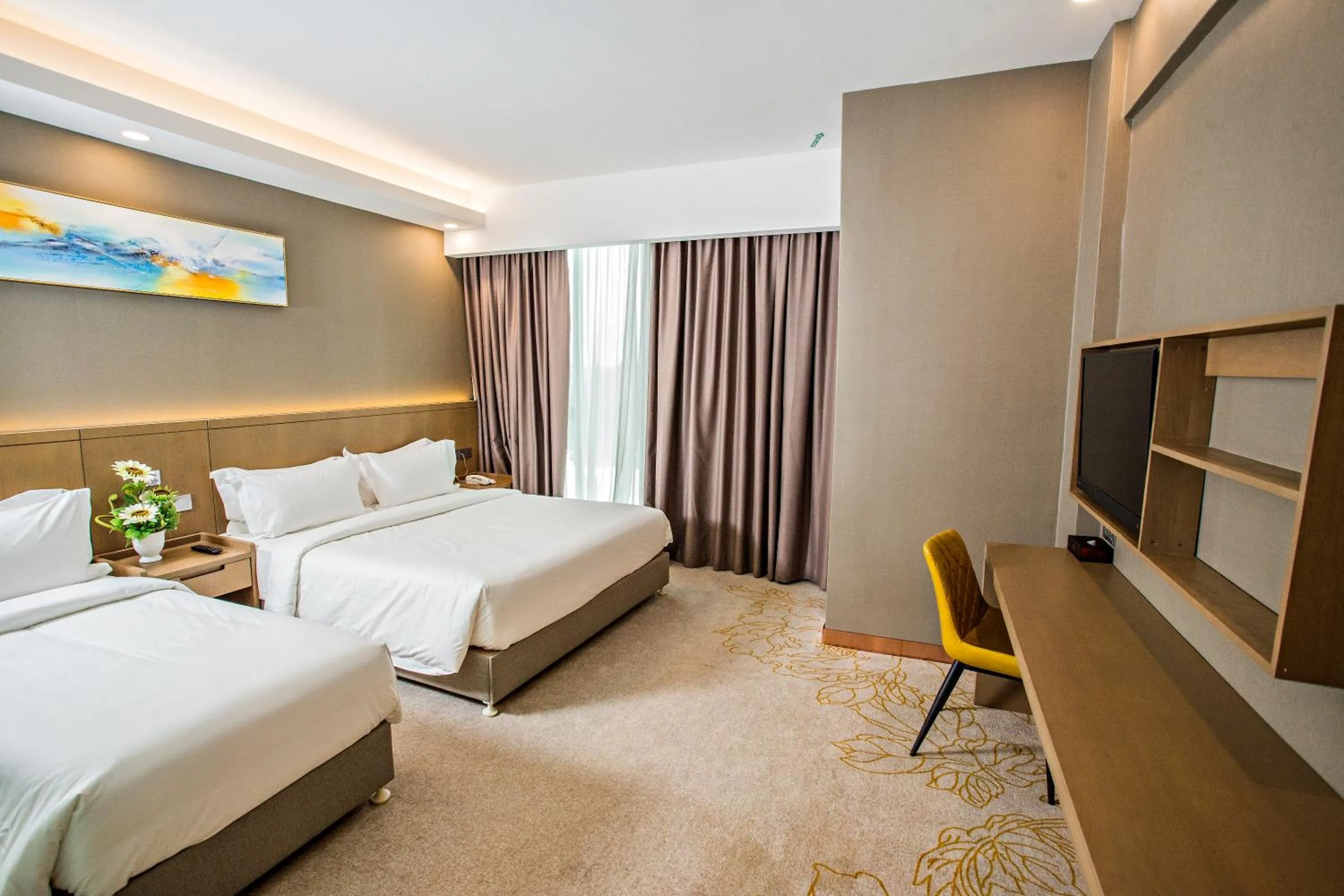 Bed in GRAND FLORA HOTEL