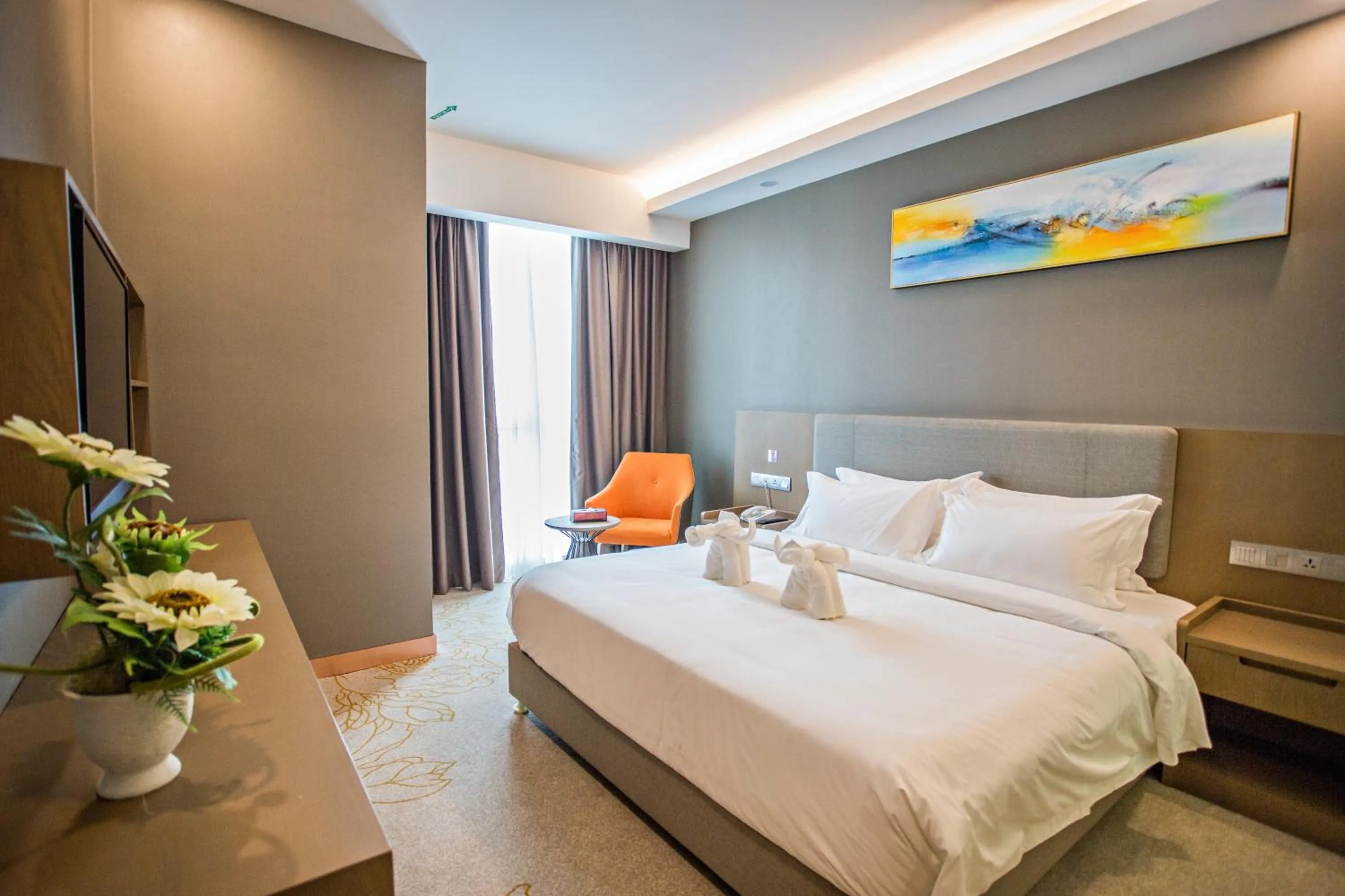 Bed in GRAND FLORA HOTEL