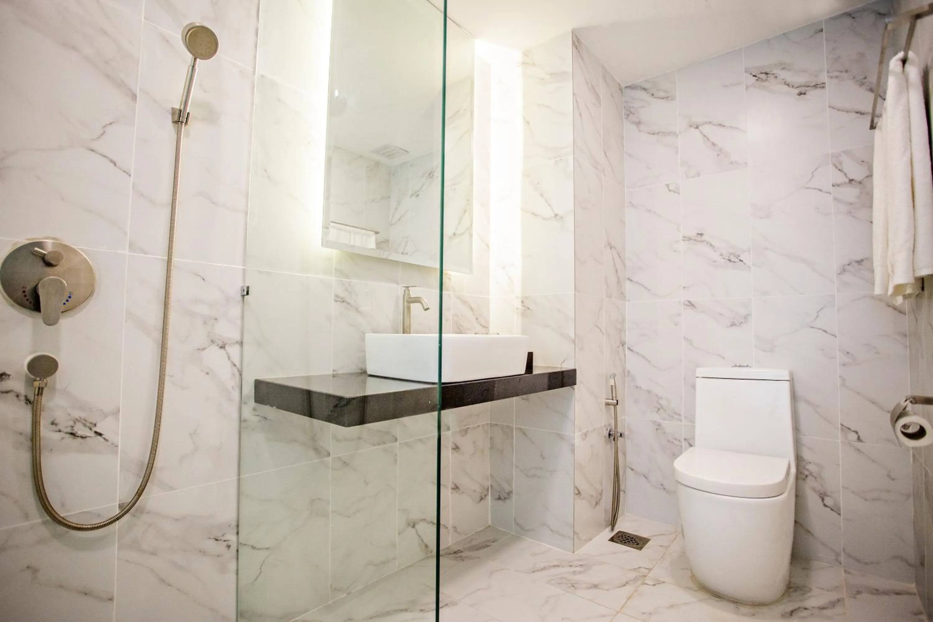 Shower in GRAND FLORA HOTEL