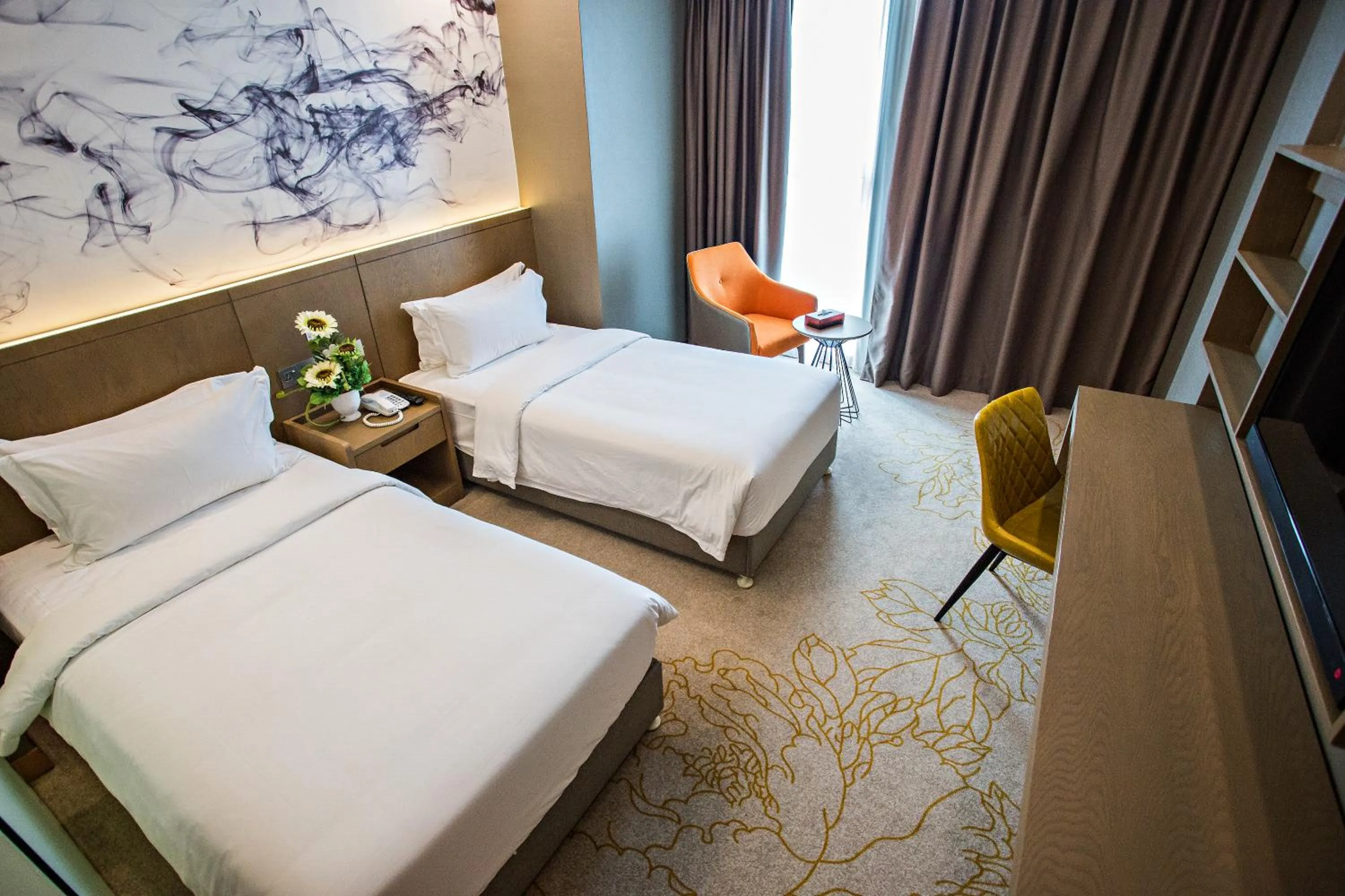 Bed in GRAND FLORA HOTEL