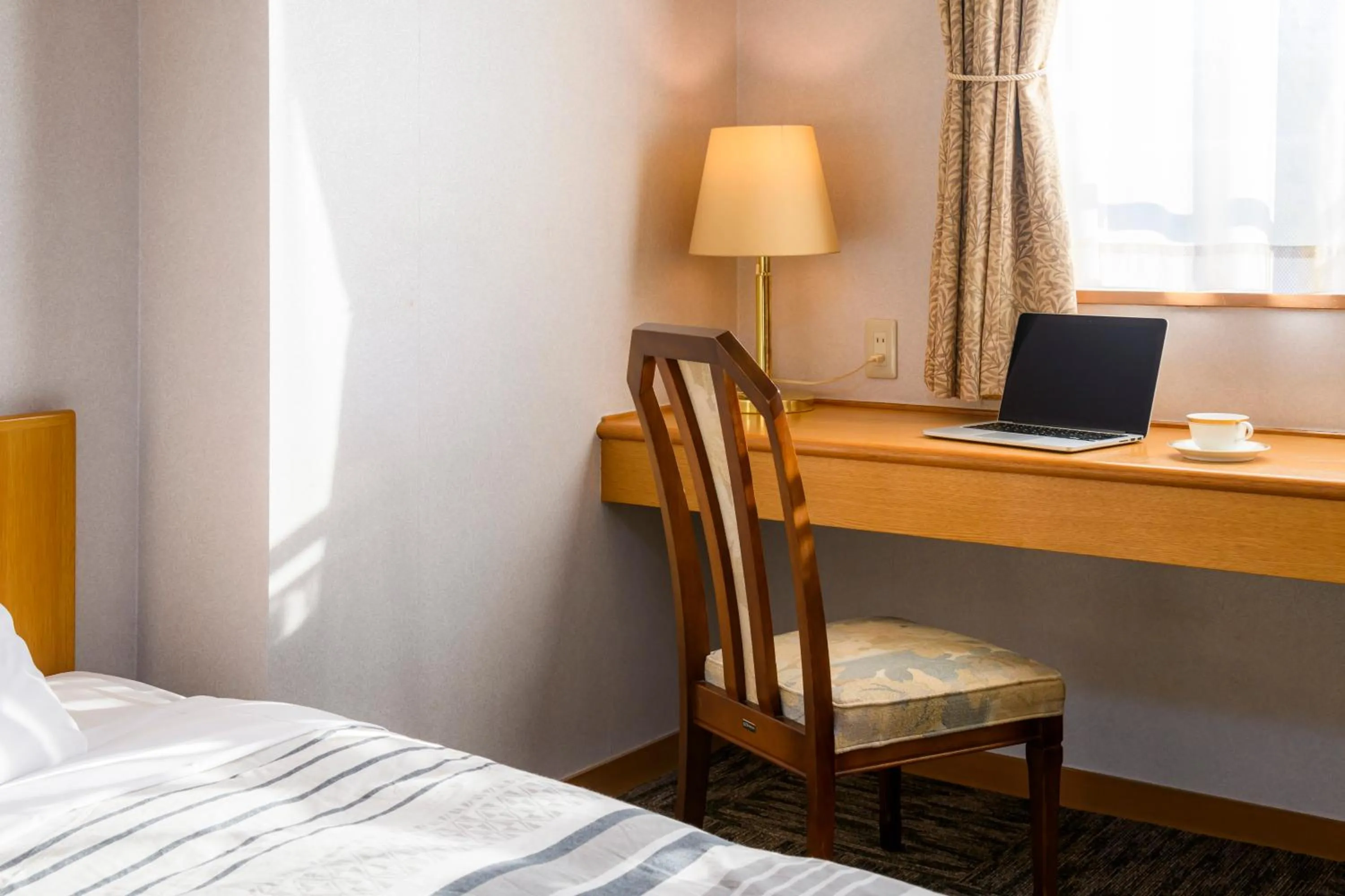 Photo of the whole room, Bed in Hotel Symphony Sagae Onsen
