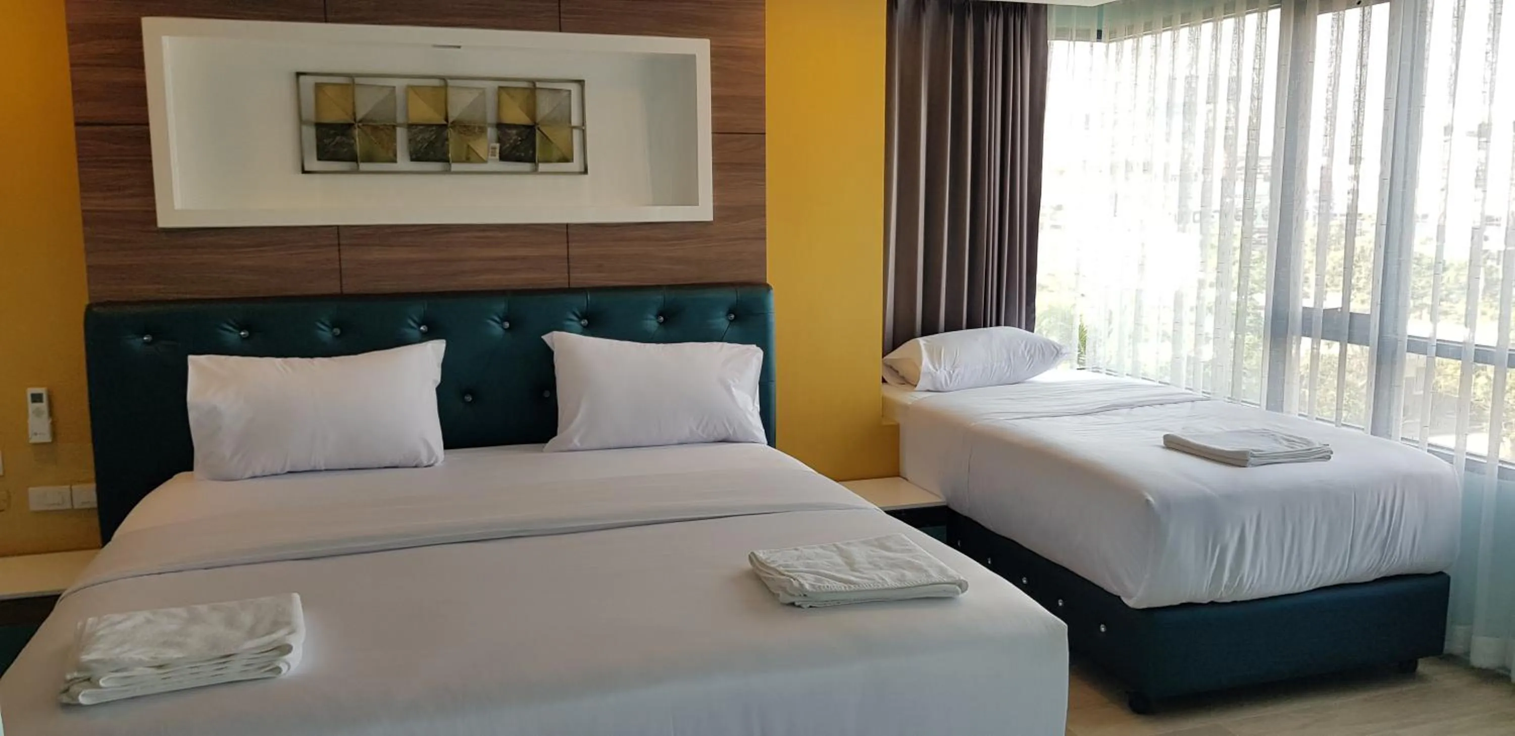 Bed in BlueTel Re'sidencE Bangkok IMPACT บลูเทล เรซิดองส์ กรุงเทพ อิมแพค