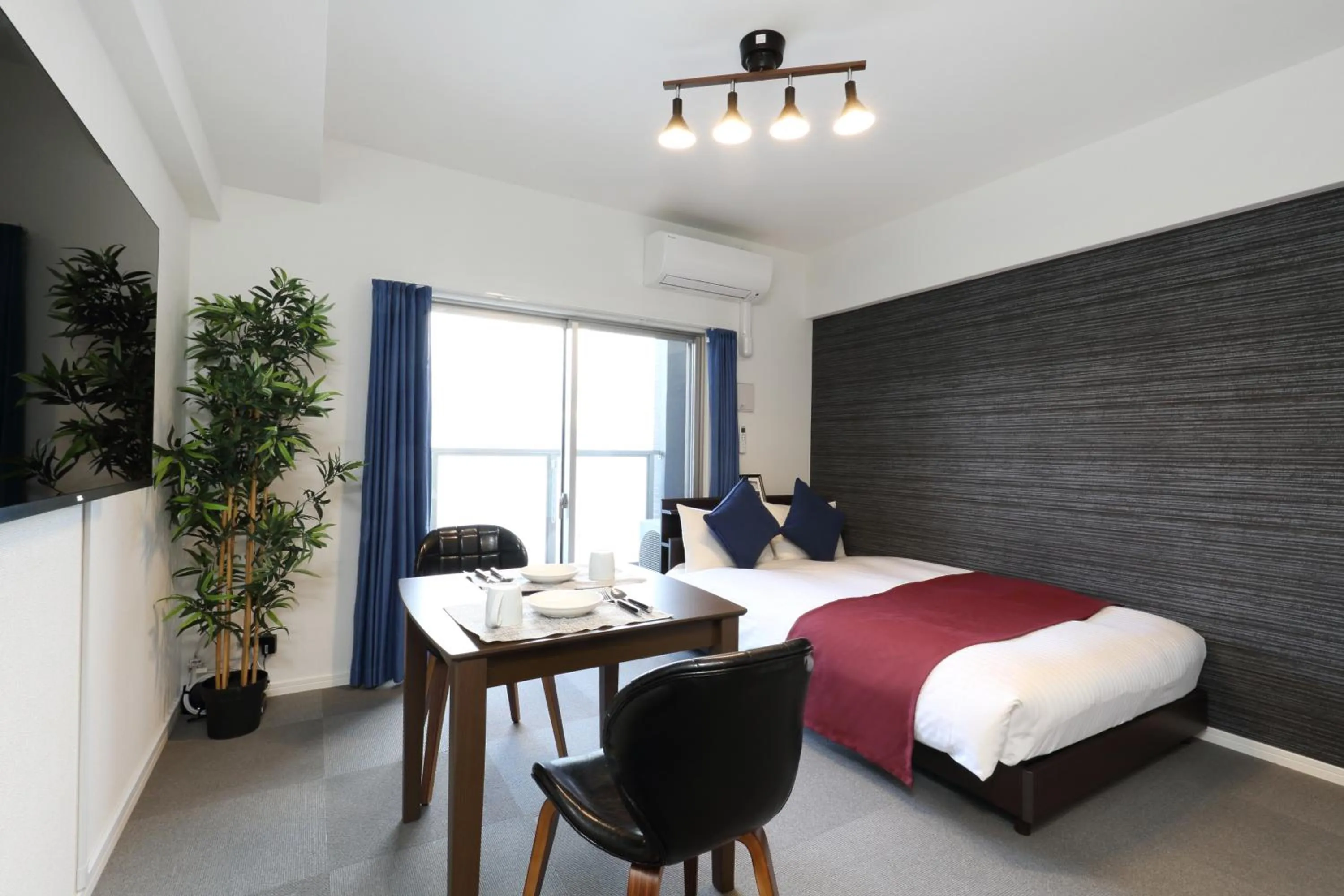 Bed in The Grand Residence Hotel Hakata