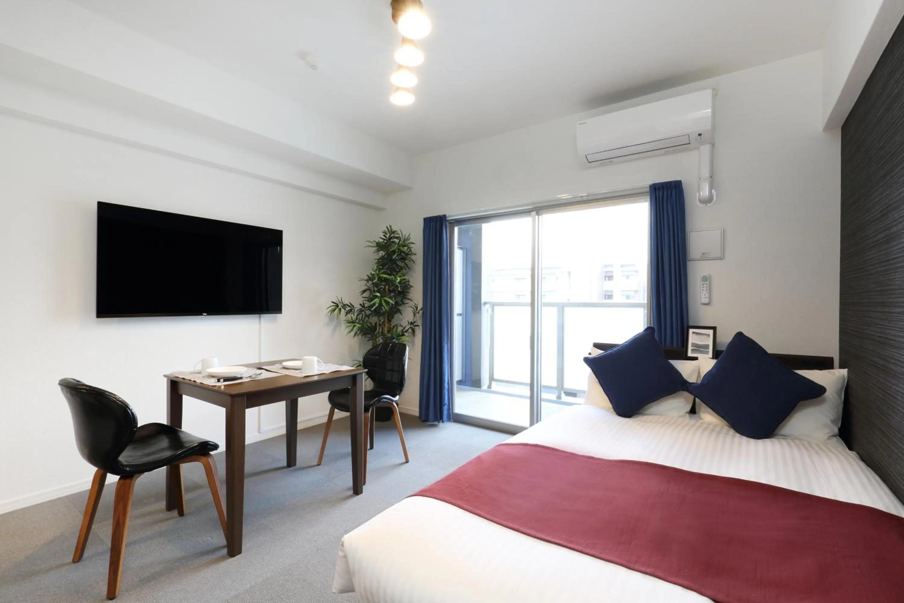 Bed in The Grand Residence Hotel Hakata