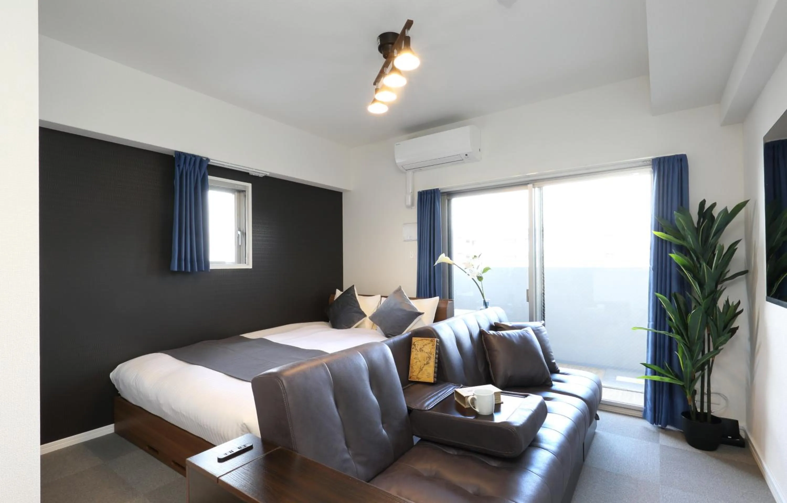 Living room, Bed in The Grand Residence Hotel Hakata