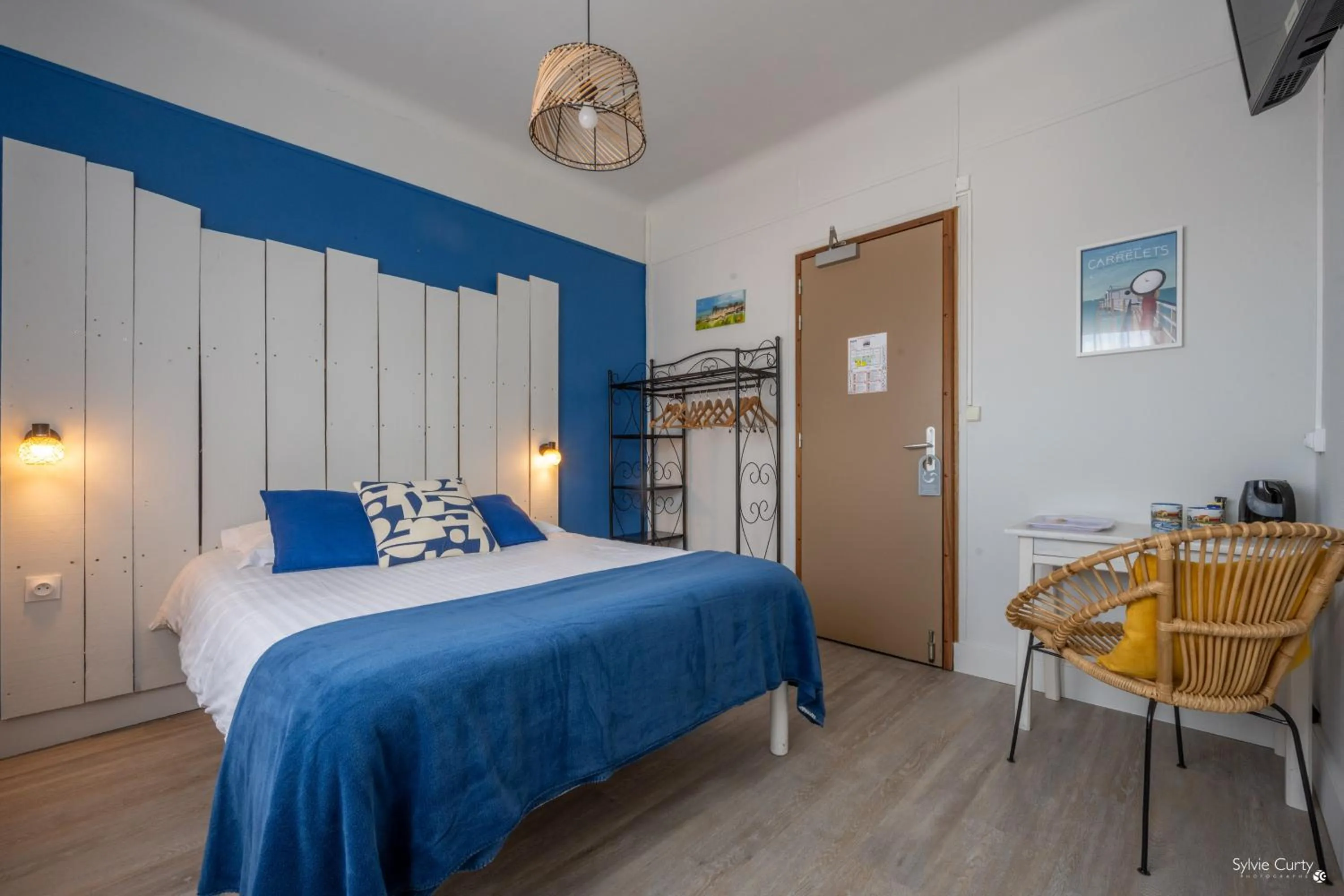 Bed in Hotel La Roseraie