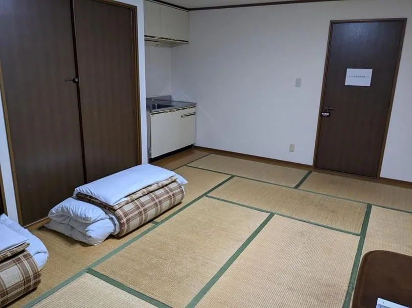 Bed in Tabist Business Hotel Kaigansou Gamagori