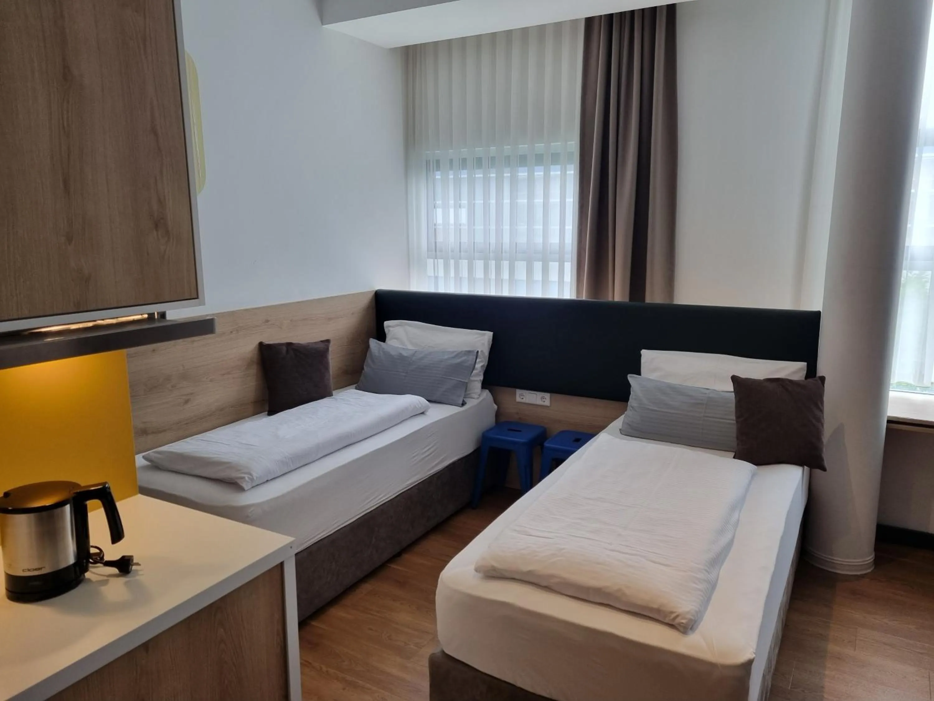 soundproof, Bed in my MINGA Airport serviced Apartments