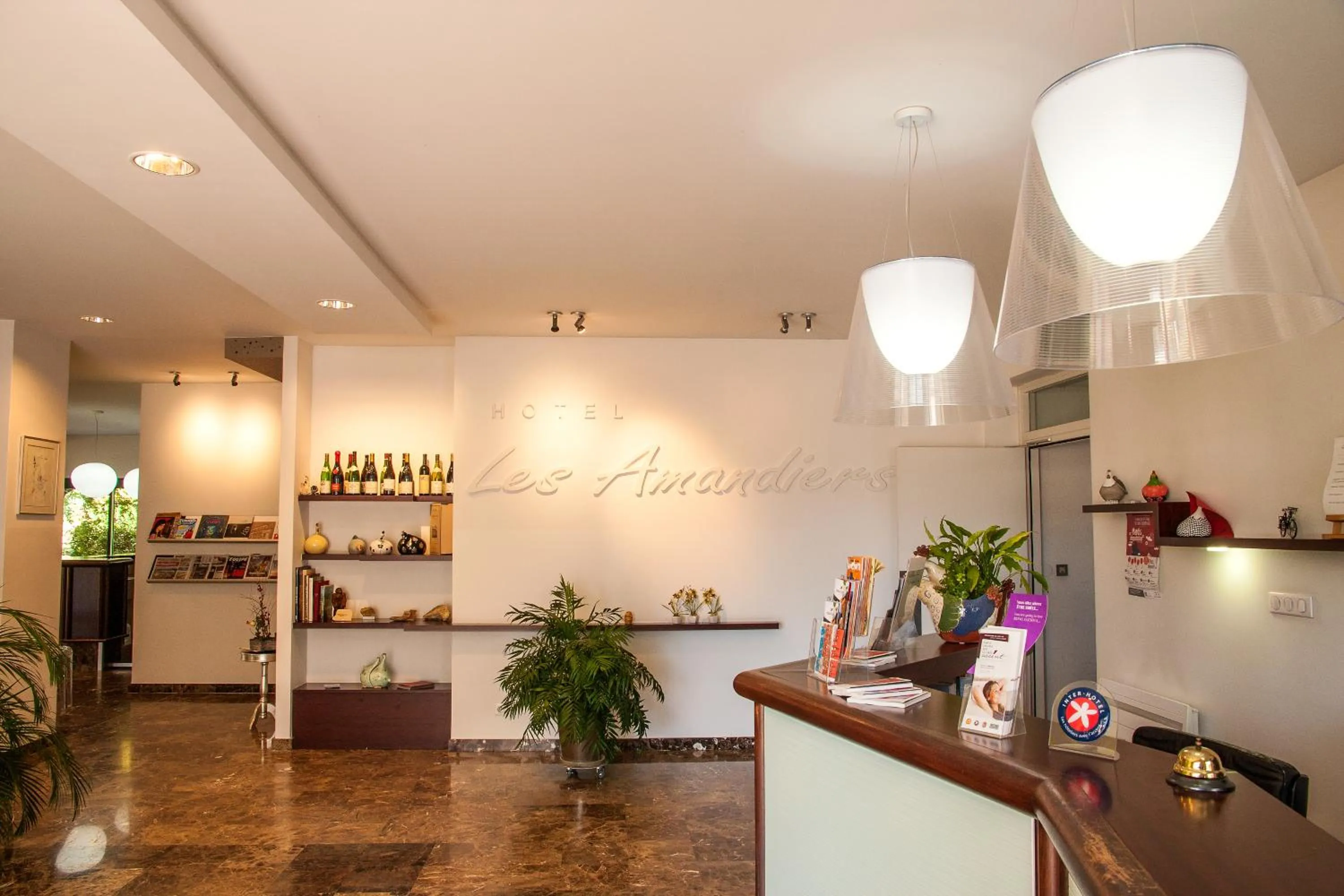 Lobby or reception in Hotel Les Amandiers