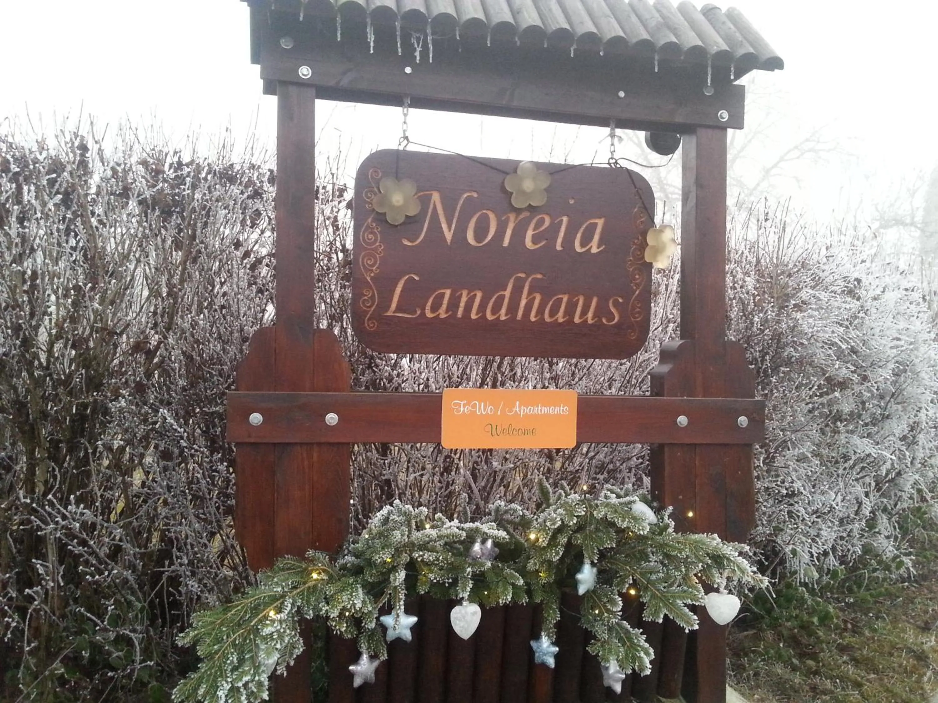 Property logo or sign in Landhaus Noreia