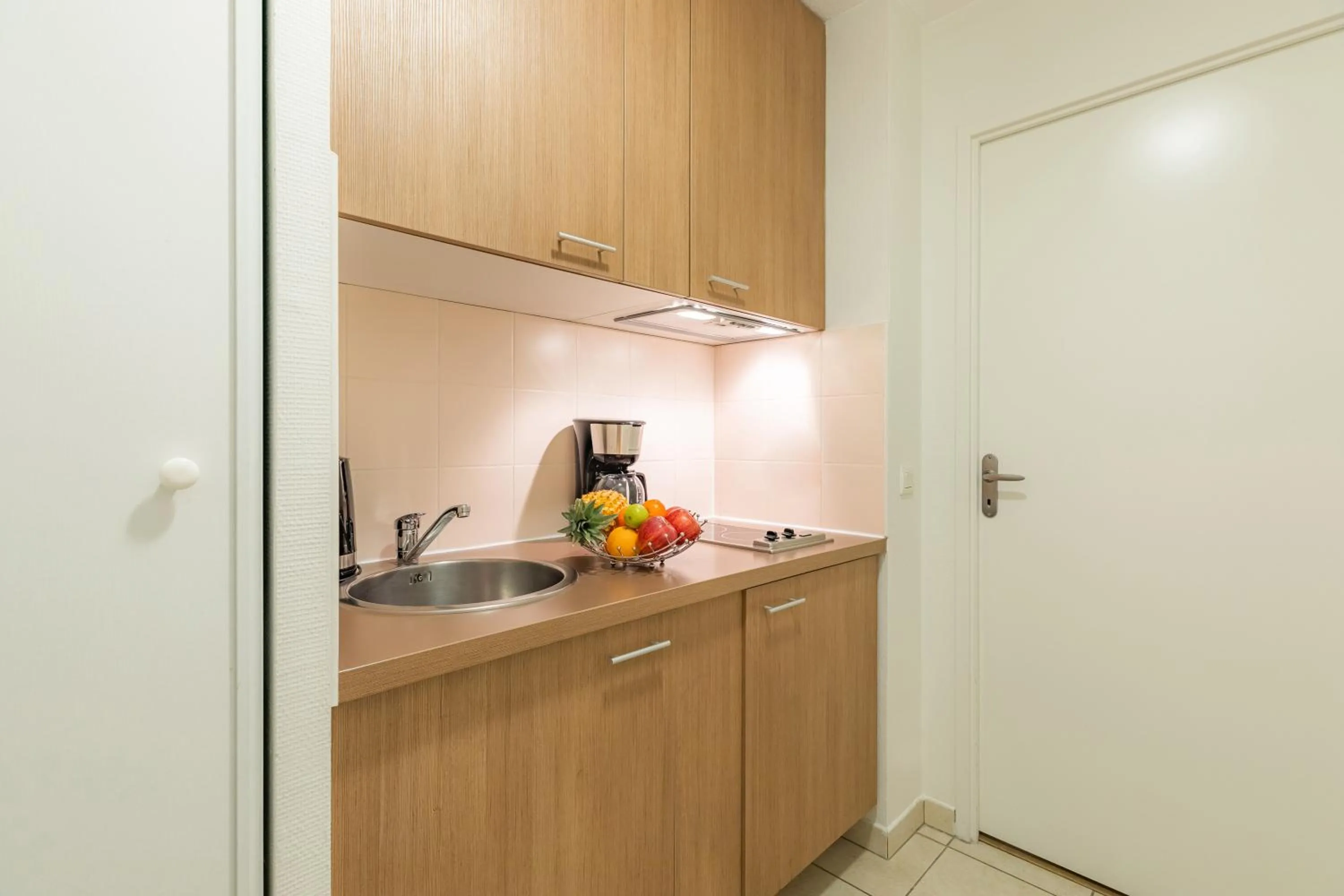 Kitchen or kitchenette in Appart'City Confort Toulouse Purpan