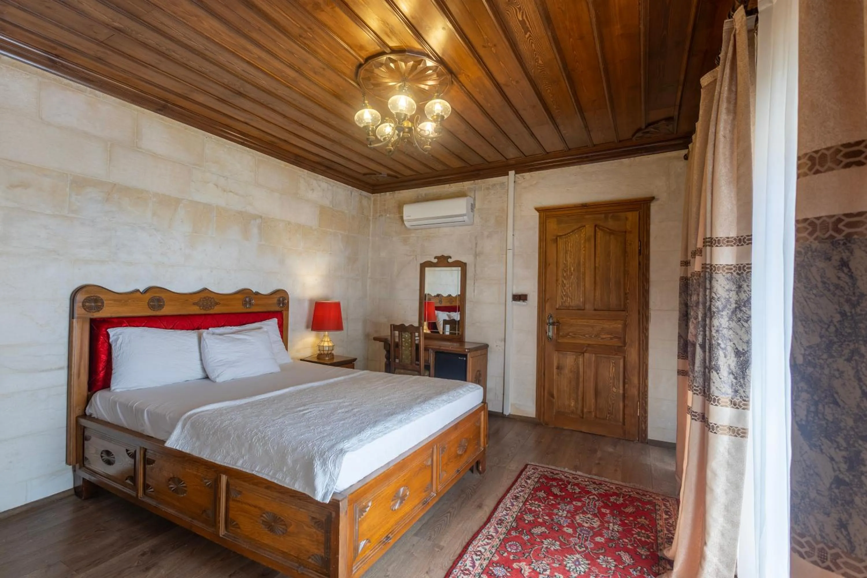 Bed in PALMYRA BOUTIQUE HOTEL