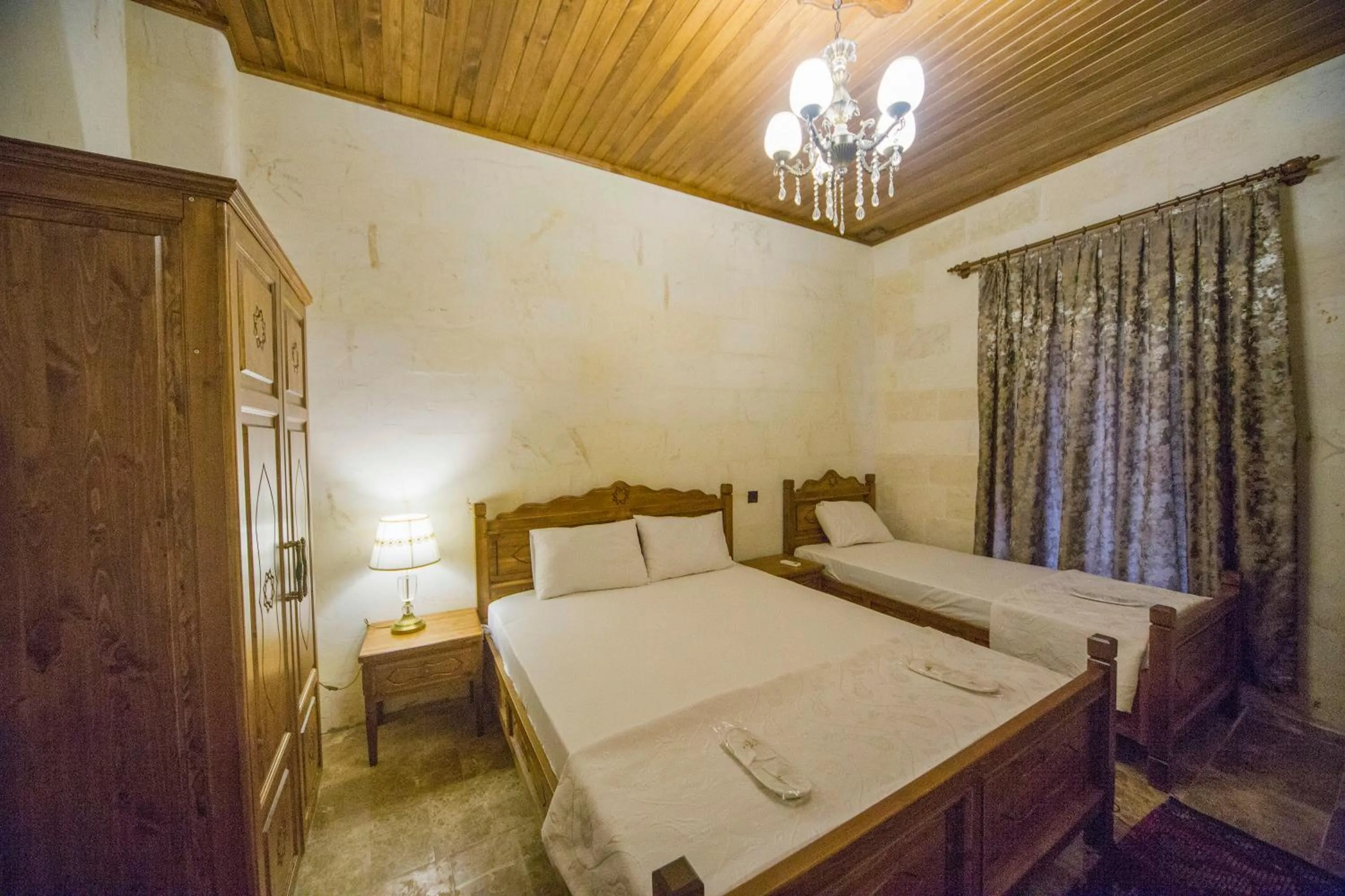 Bed in PALMYRA BOUTIQUE HOTEL