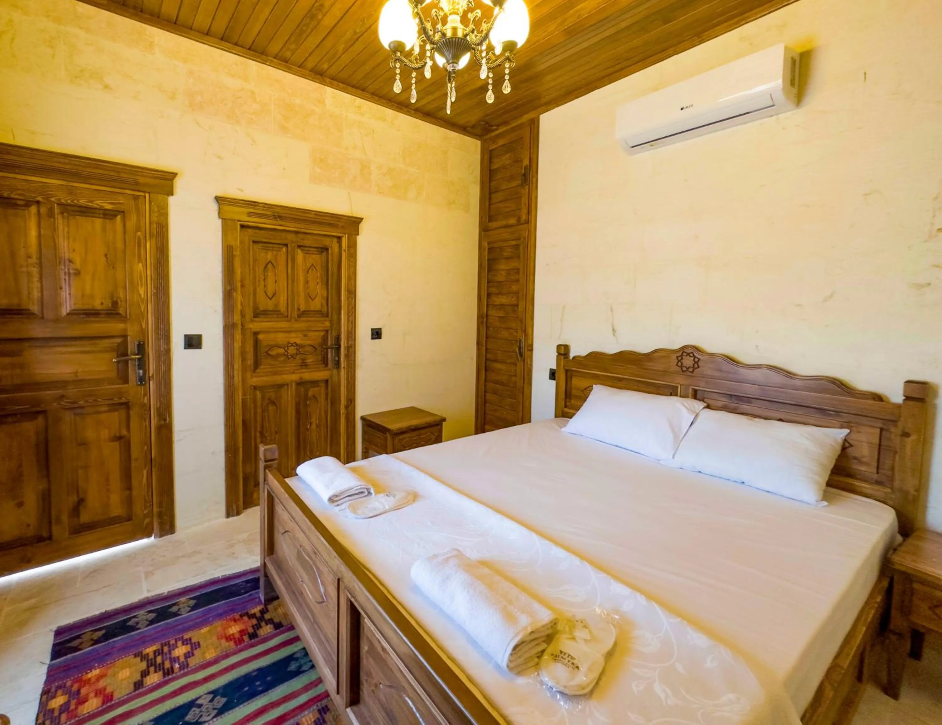 Bed in PALMYRA BOUTIQUE HOTEL