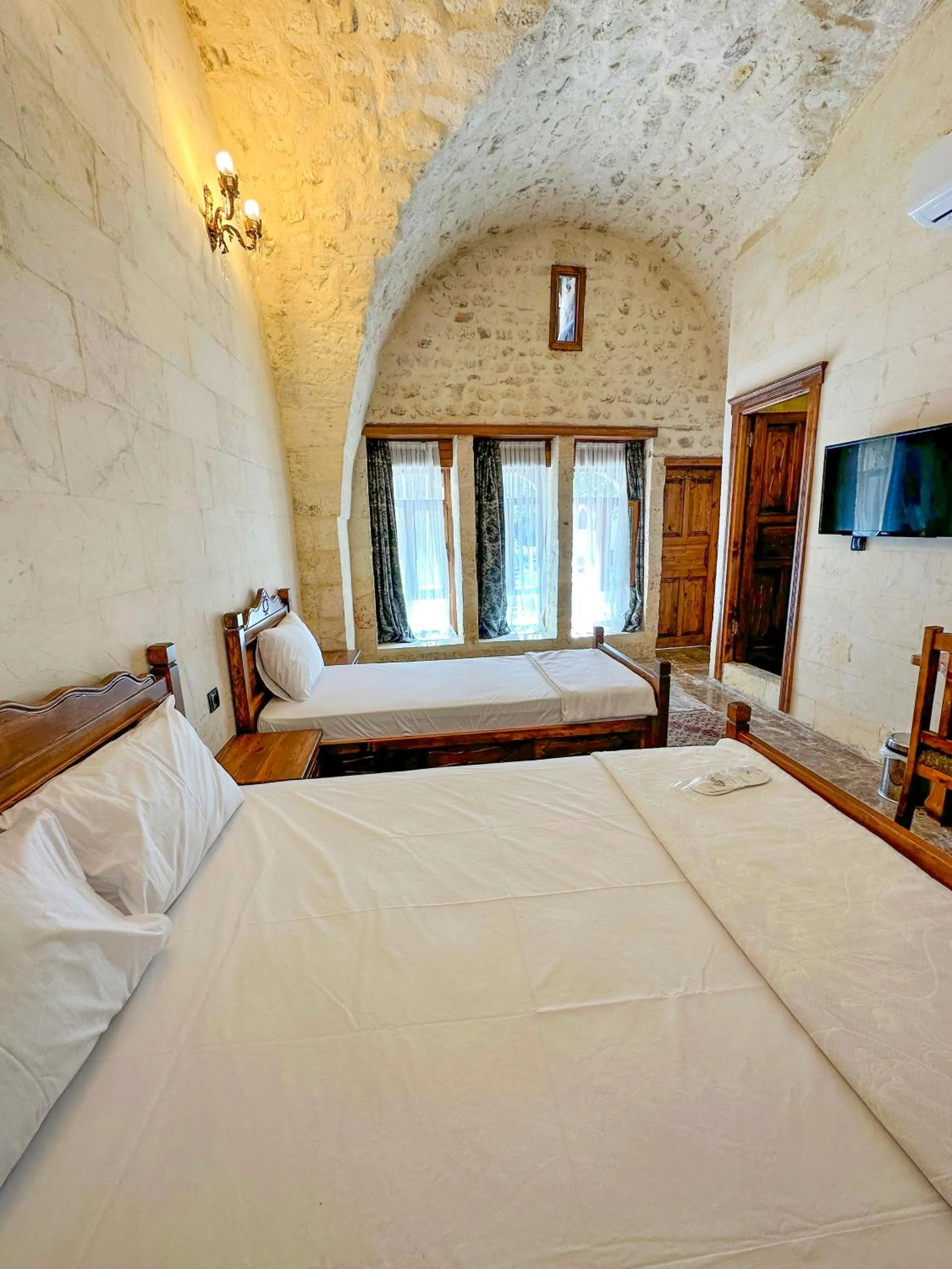 Bed in PALMYRA BOUTIQUE HOTEL