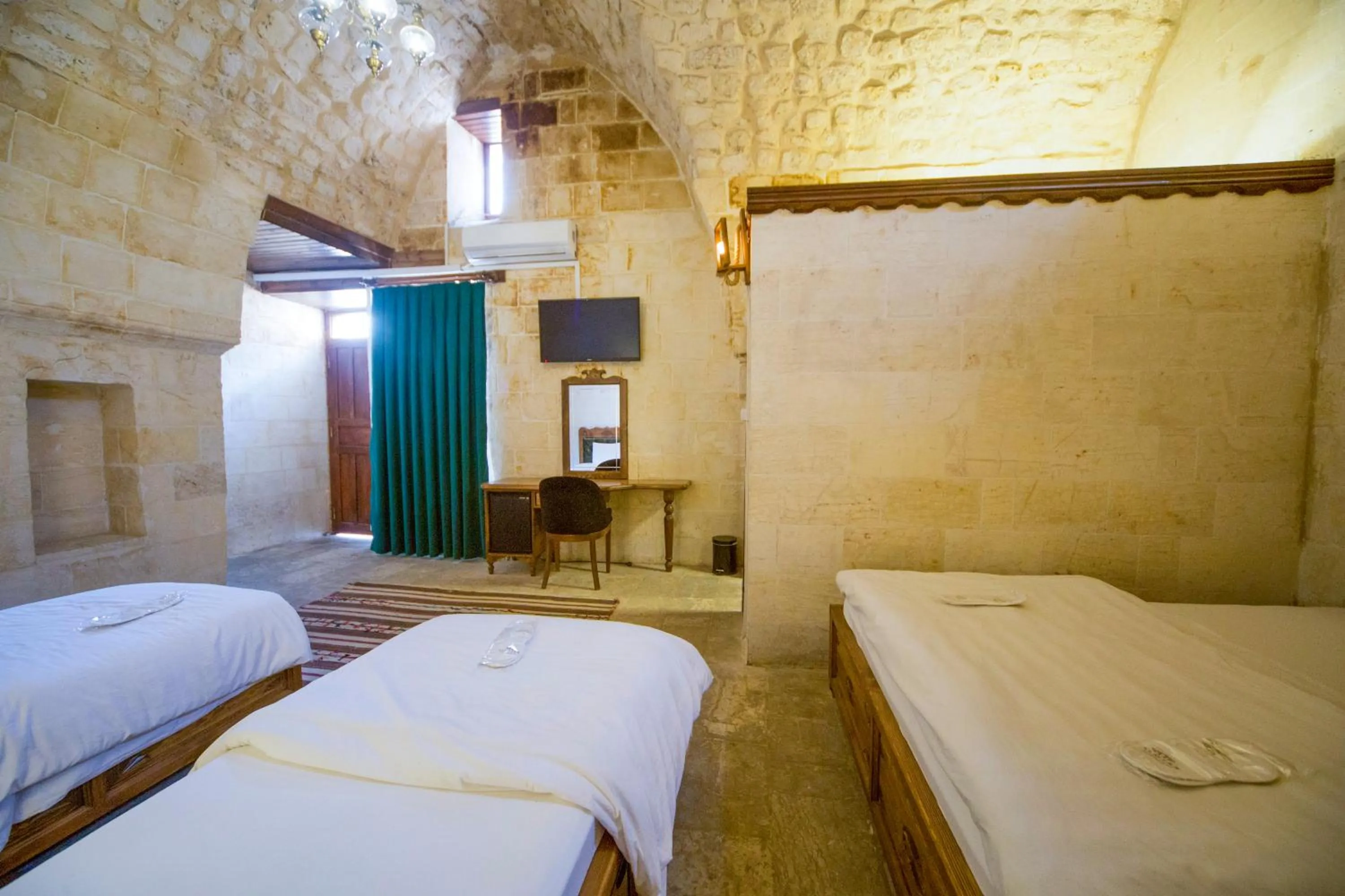 Bed in PALMYRA BOUTIQUE HOTEL