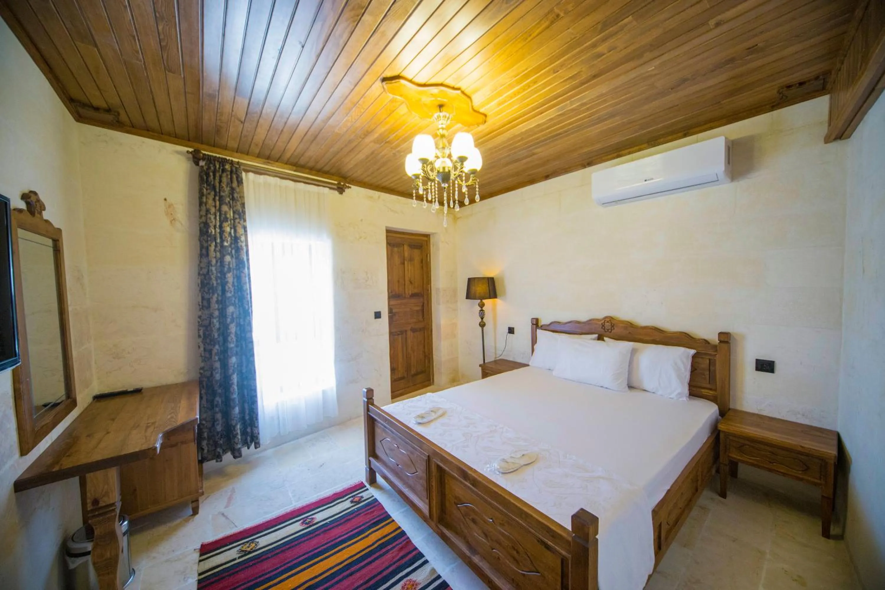 Bed in PALMYRA BOUTIQUE HOTEL