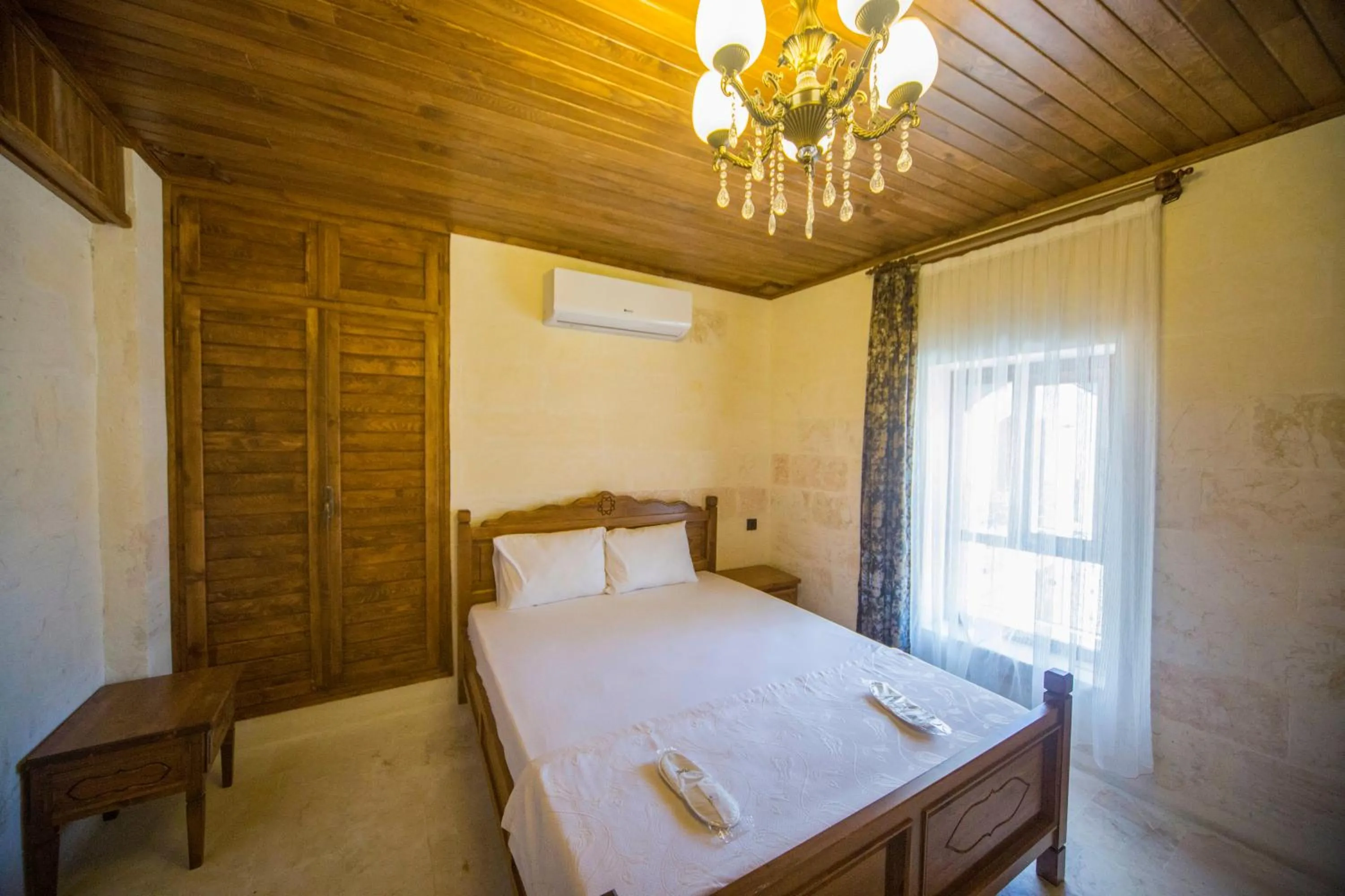 Bed in PALMYRA BOUTIQUE HOTEL