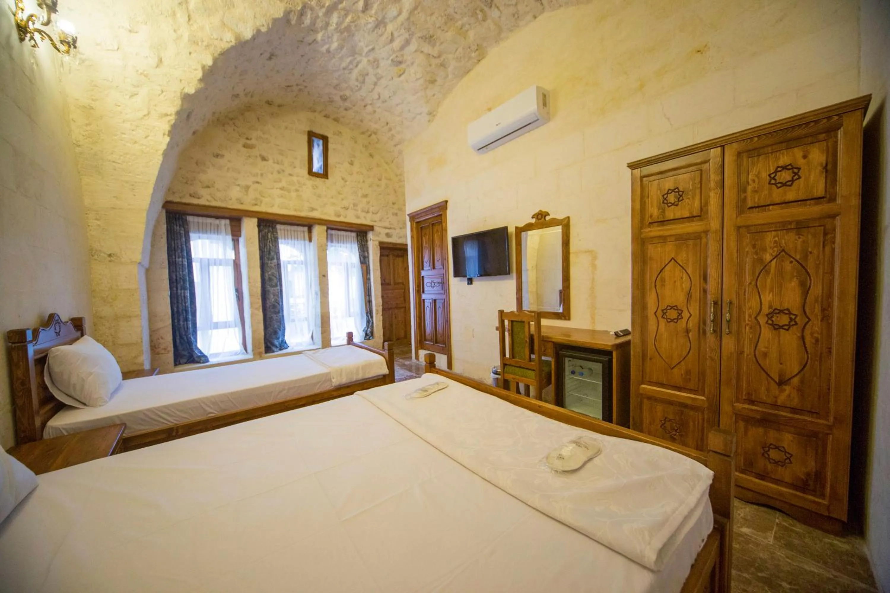 Bed in PALMYRA BOUTIQUE HOTEL