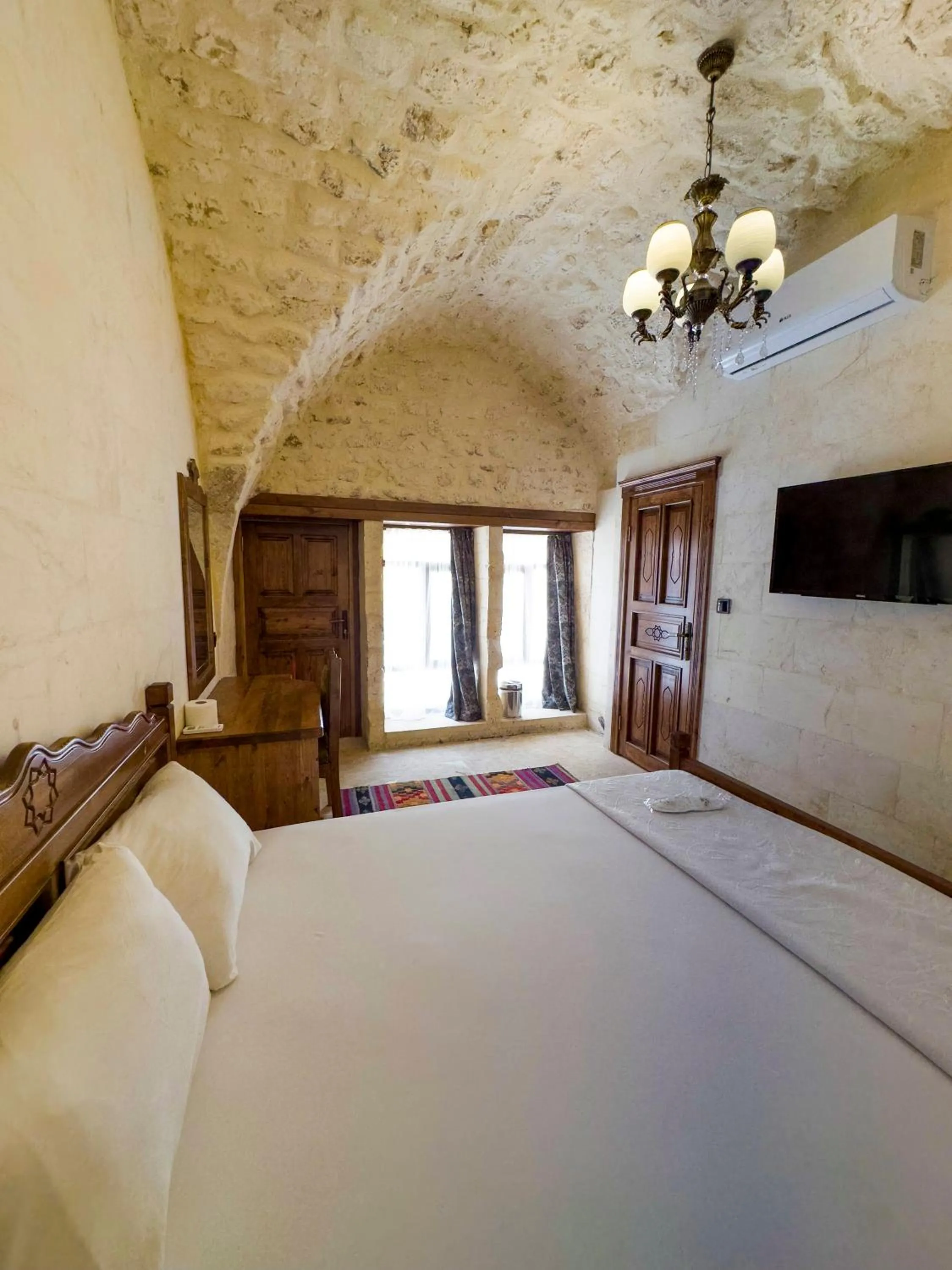 Bed in PALMYRA BOUTIQUE HOTEL