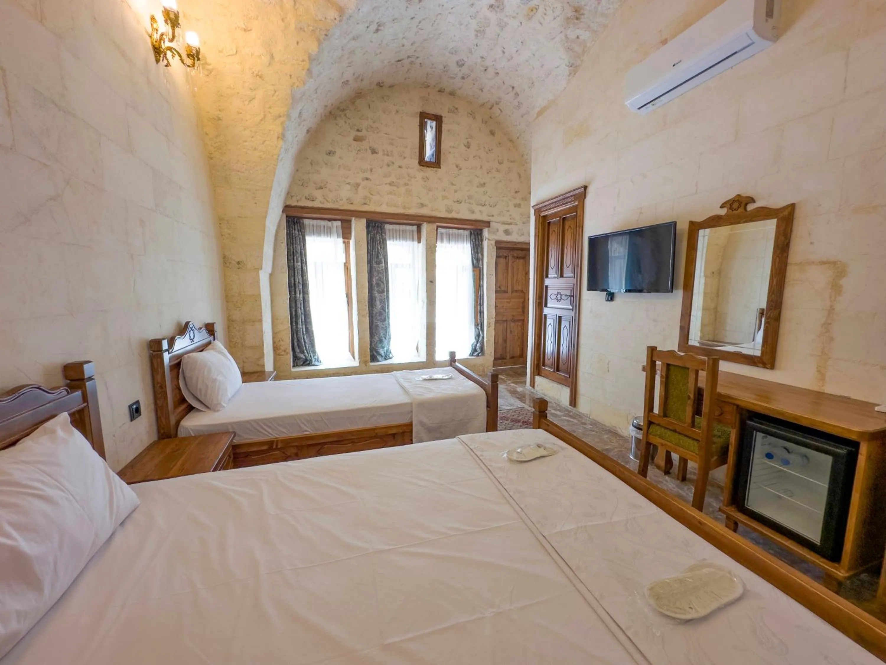 Bed in PALMYRA BOUTIQUE HOTEL