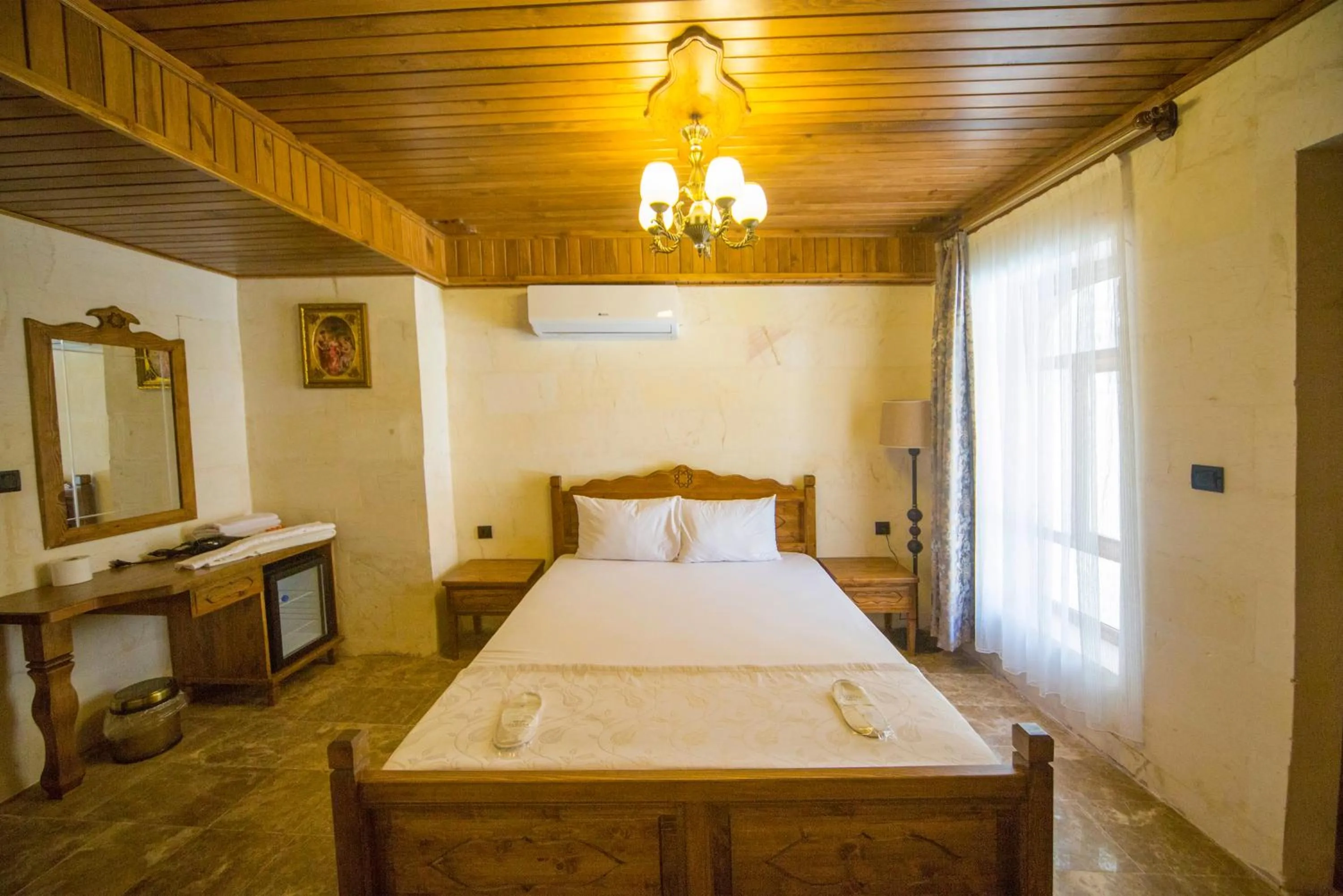 Bed in PALMYRA BOUTIQUE HOTEL