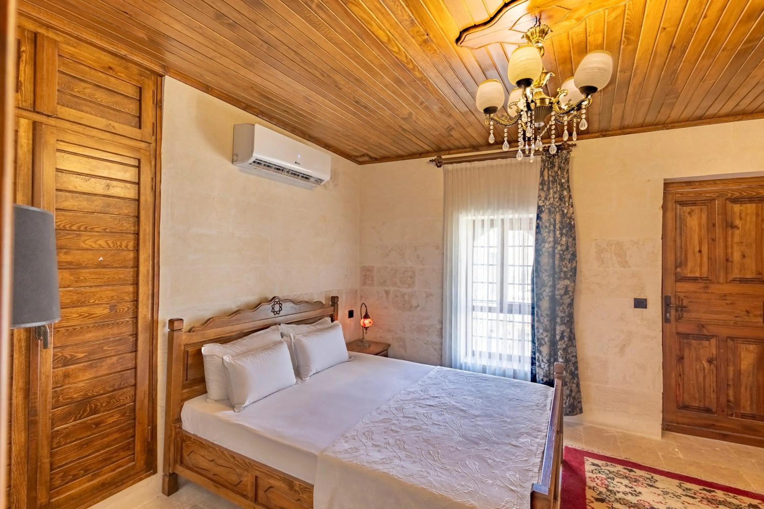 Bed in PALMYRA BOUTIQUE HOTEL