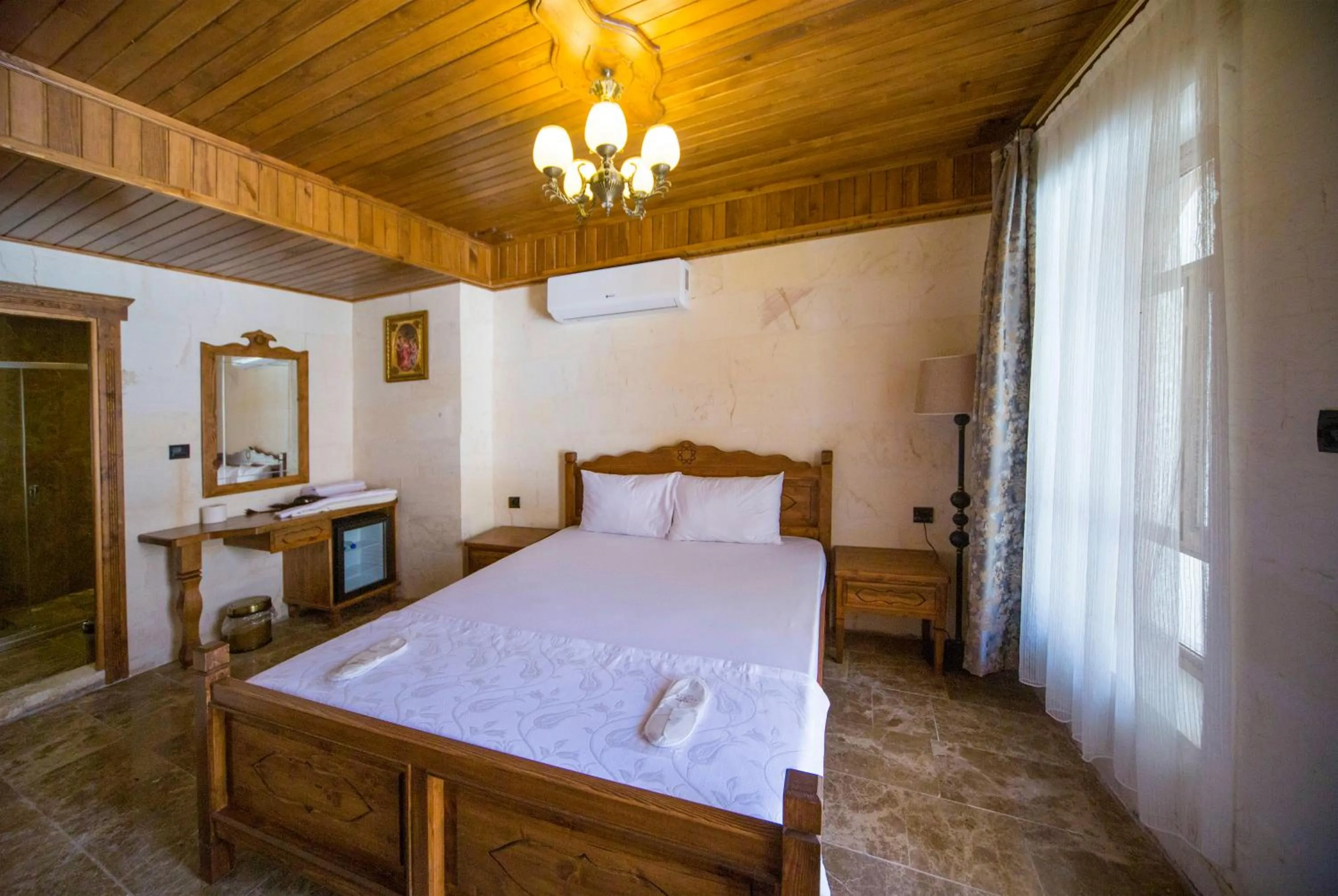 Bed in PALMYRA BOUTIQUE HOTEL