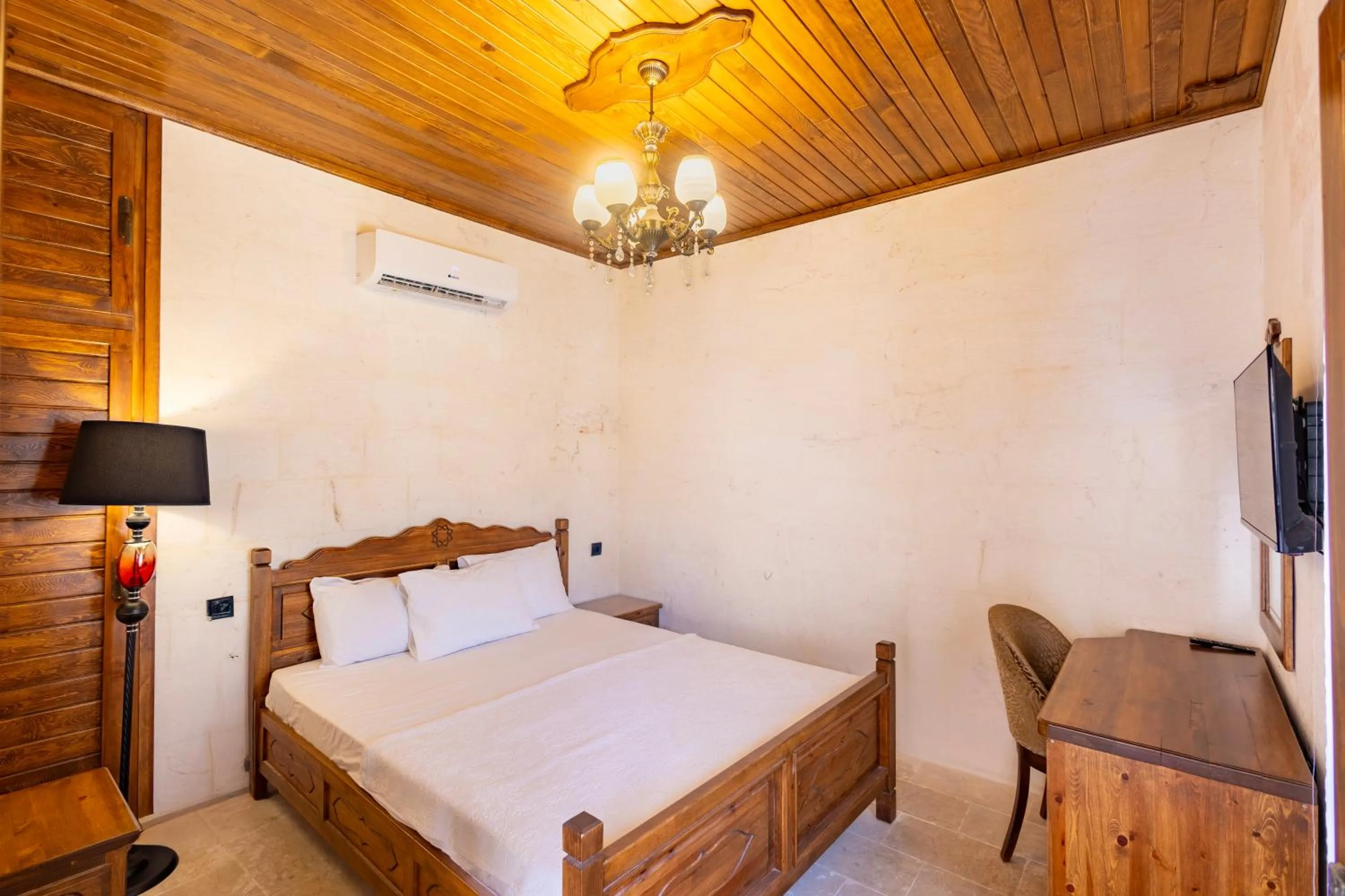 Bed in PALMYRA BOUTIQUE HOTEL