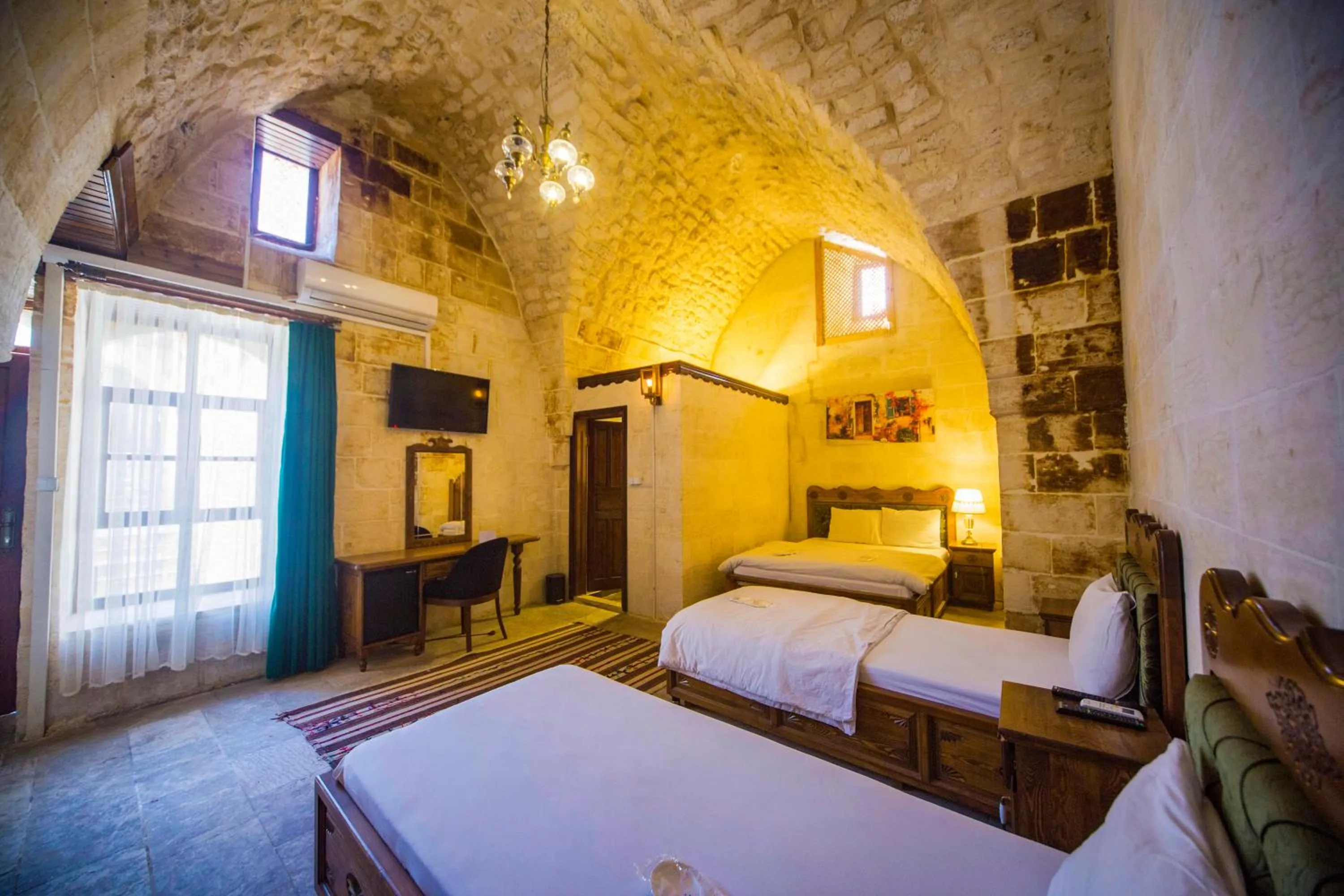 Bed in PALMYRA BOUTIQUE HOTEL