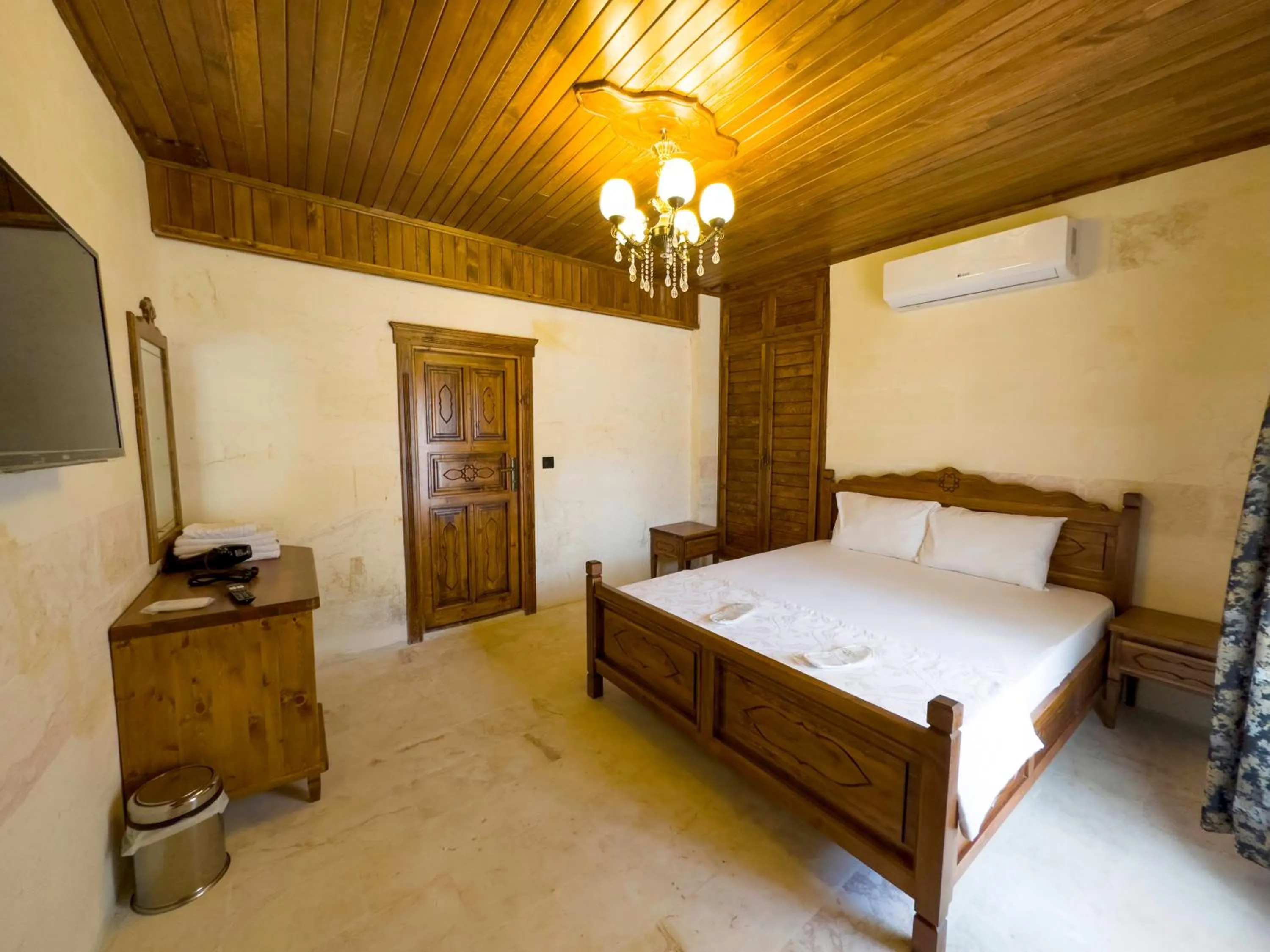 Bed in PALMYRA BOUTIQUE HOTEL