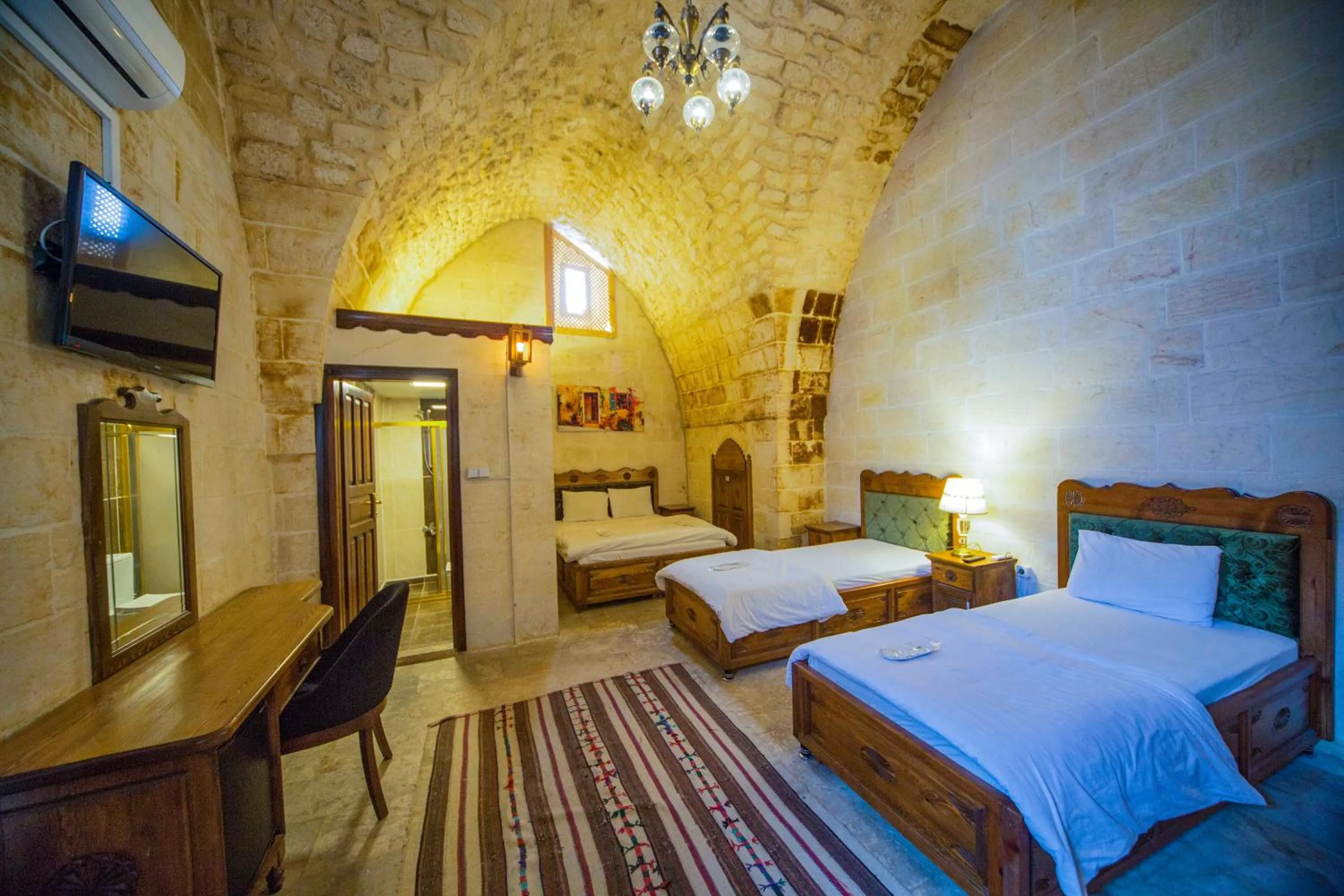 Bed in PALMYRA BOUTIQUE HOTEL