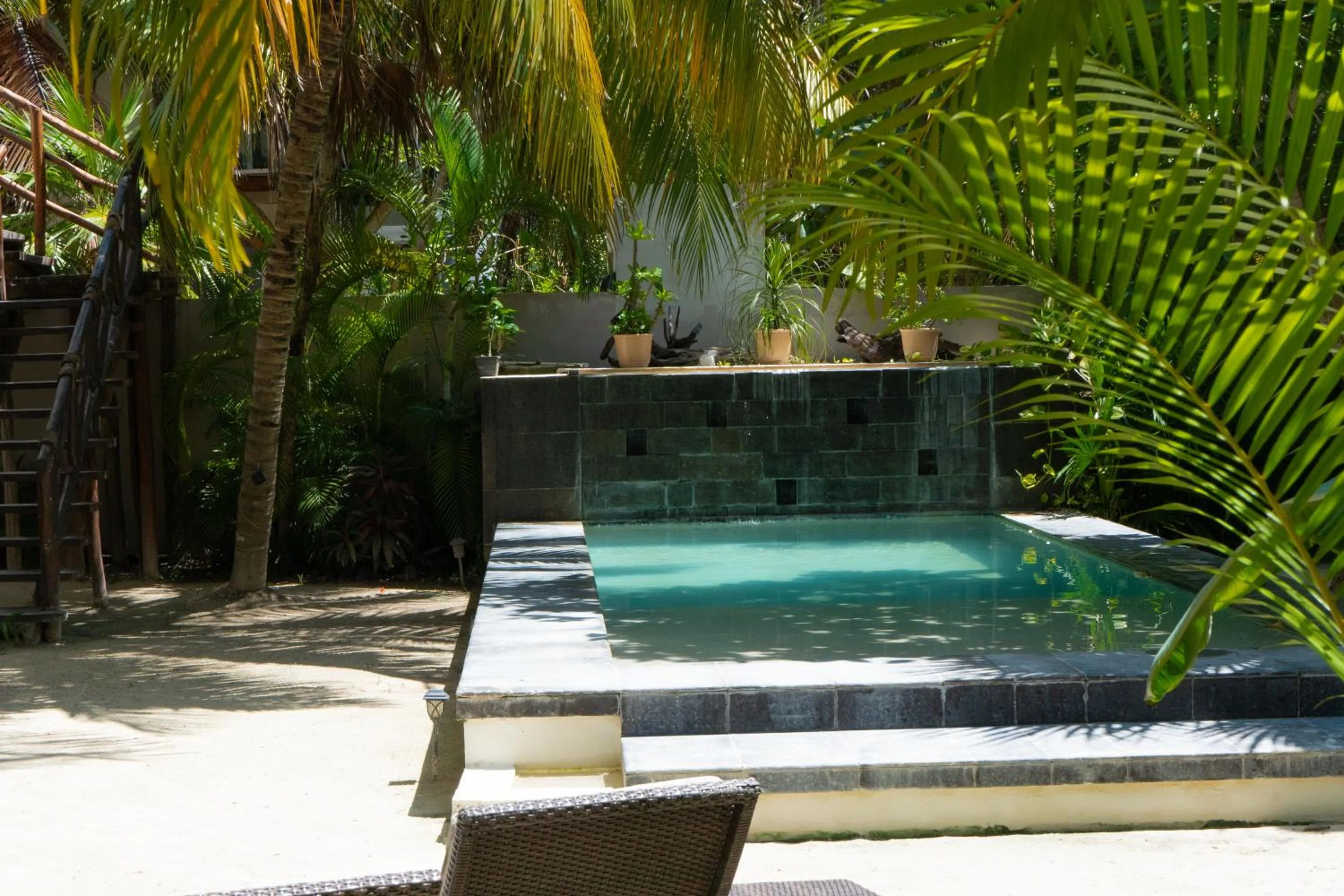 Swimming pool in Hotel Boutique La Puerta Azul Beachfront - Adults Only