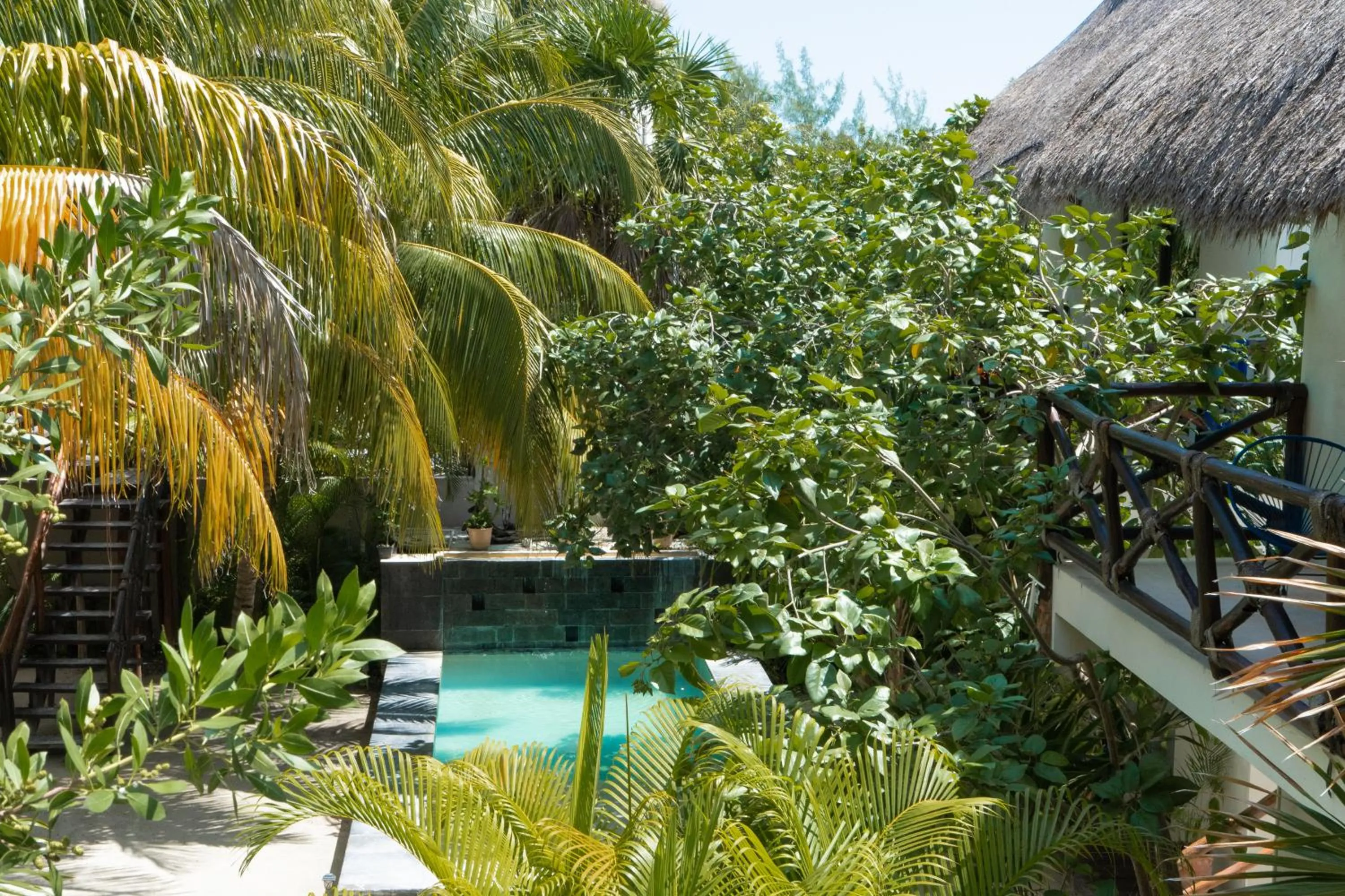 Swimming pool in Hotel Boutique La Puerta Azul Beachfront - Adults Only