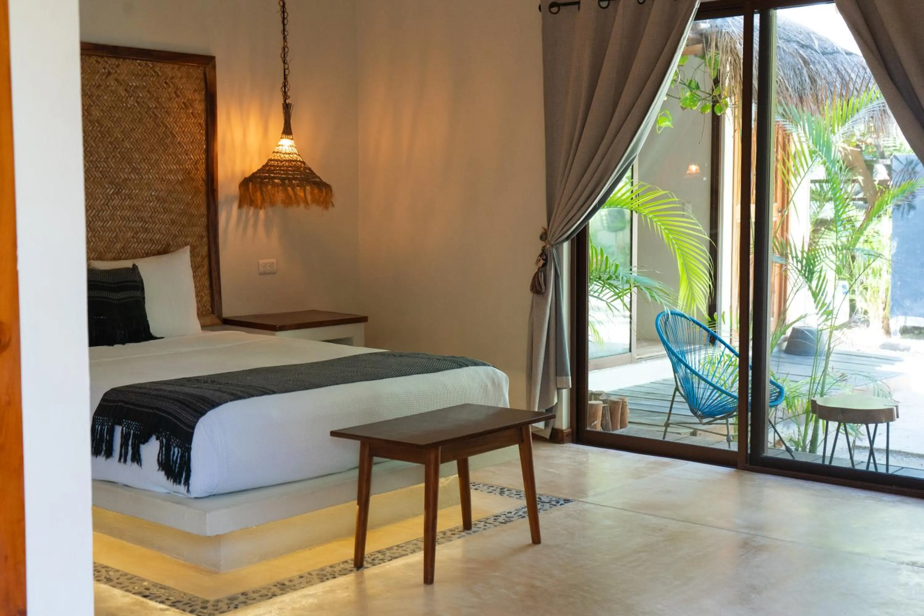 Photo of the whole room, Bed in Hotel Boutique La Puerta Azul Beachfront - Adults Only