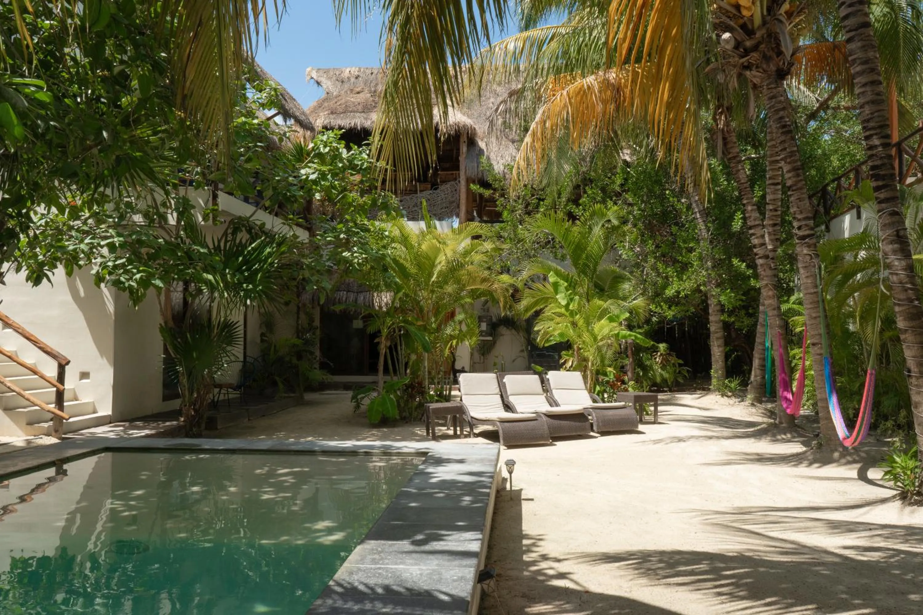 Swimming pool in Hotel Boutique La Puerta Azul Beachfront - Adults Only