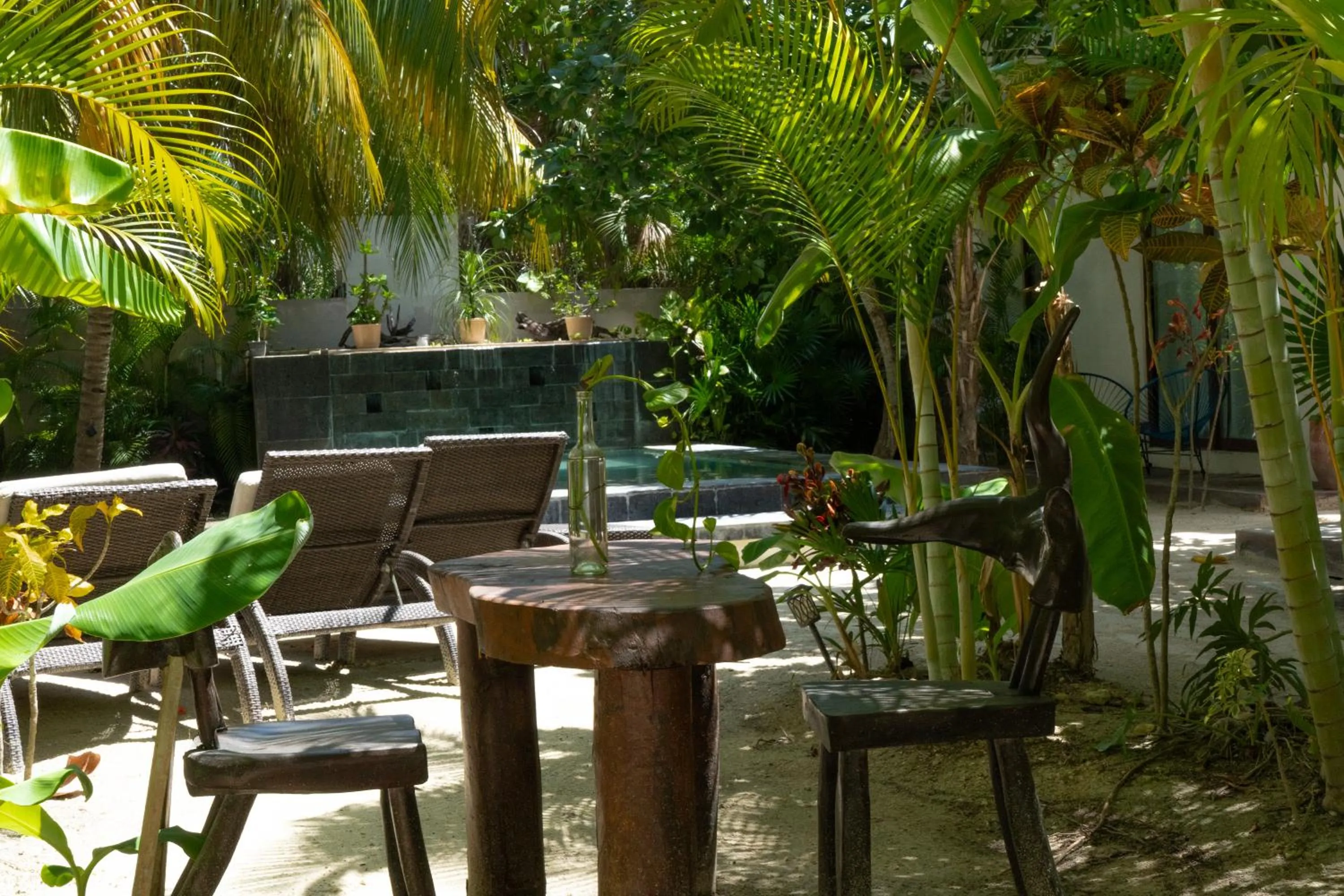 Swimming pool in Hotel Boutique La Puerta Azul Beachfront - Adults Only