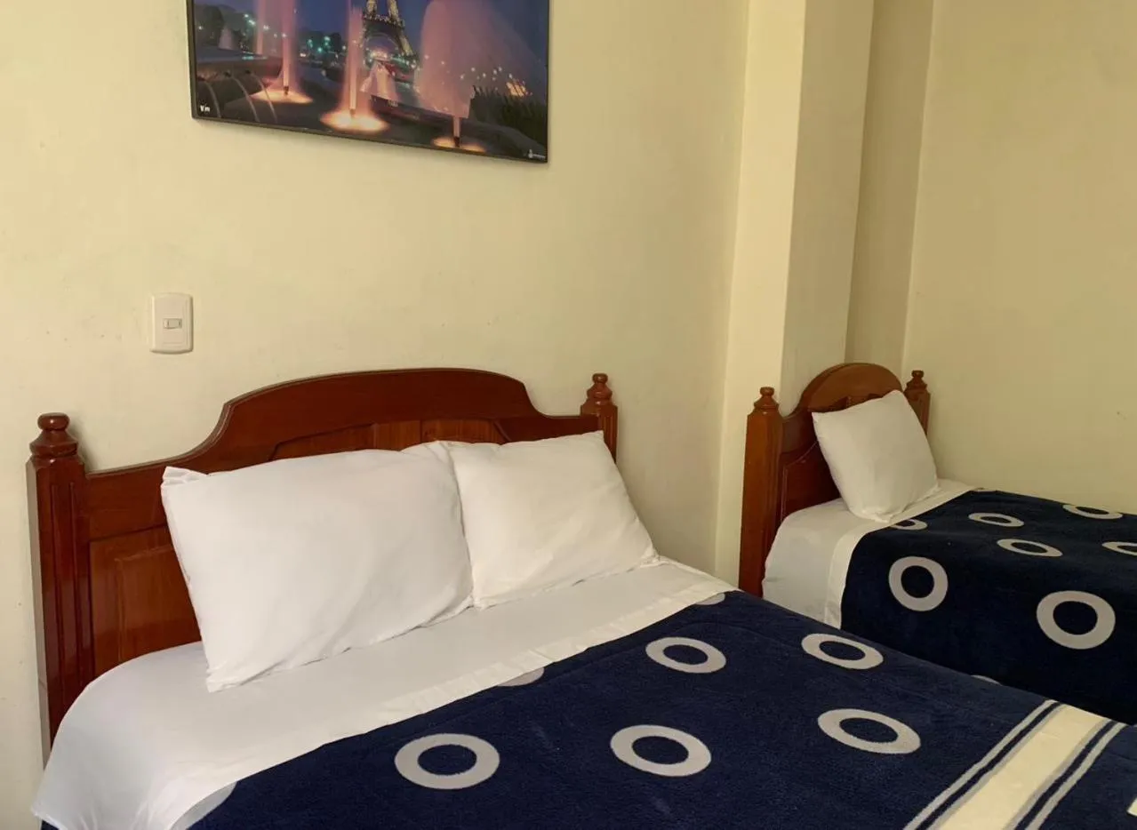 Bed in Hotel Renacimiento