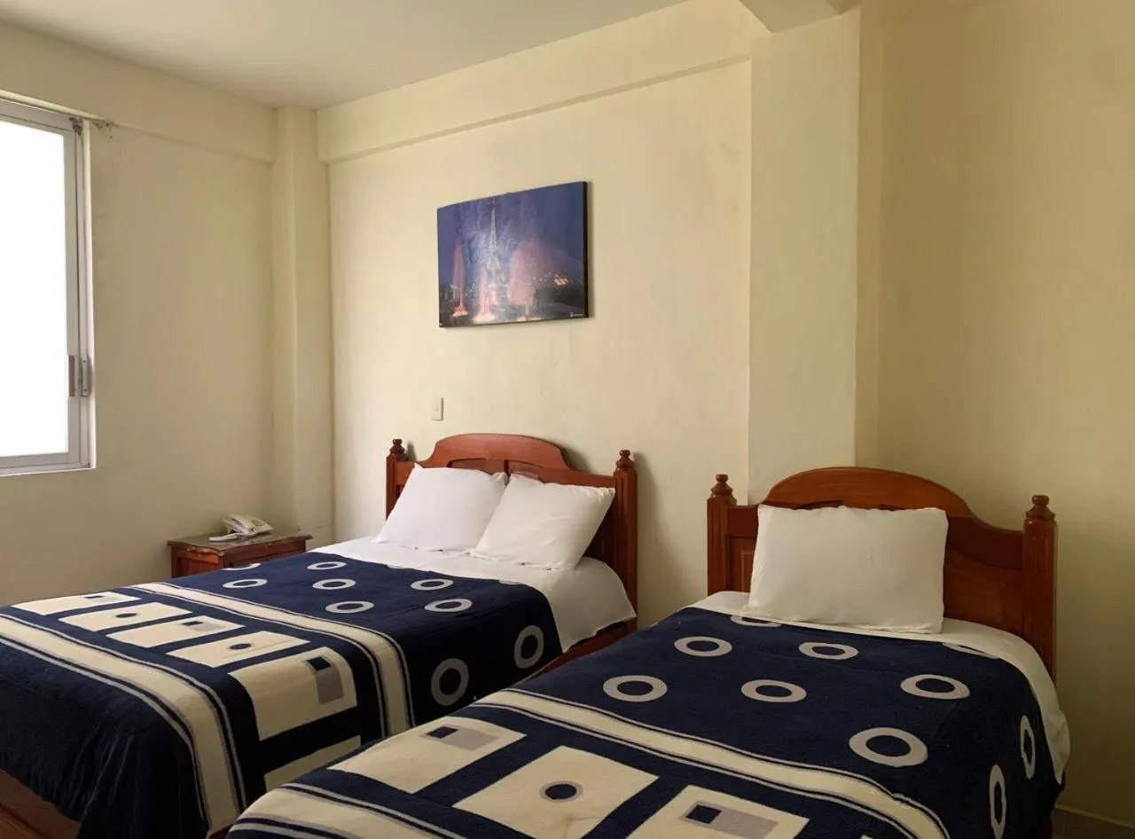 Bed in Hotel Renacimiento