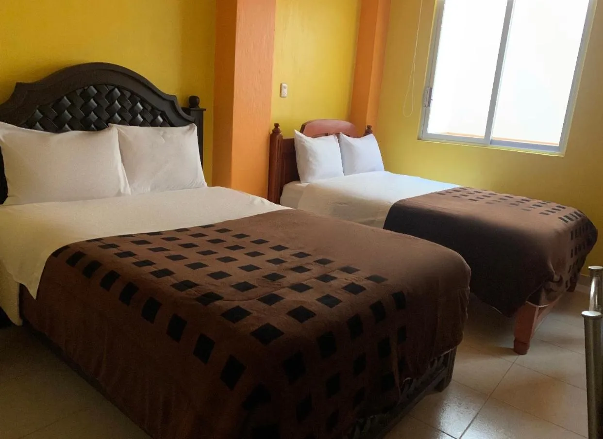 Bed in Hotel Renacimiento
